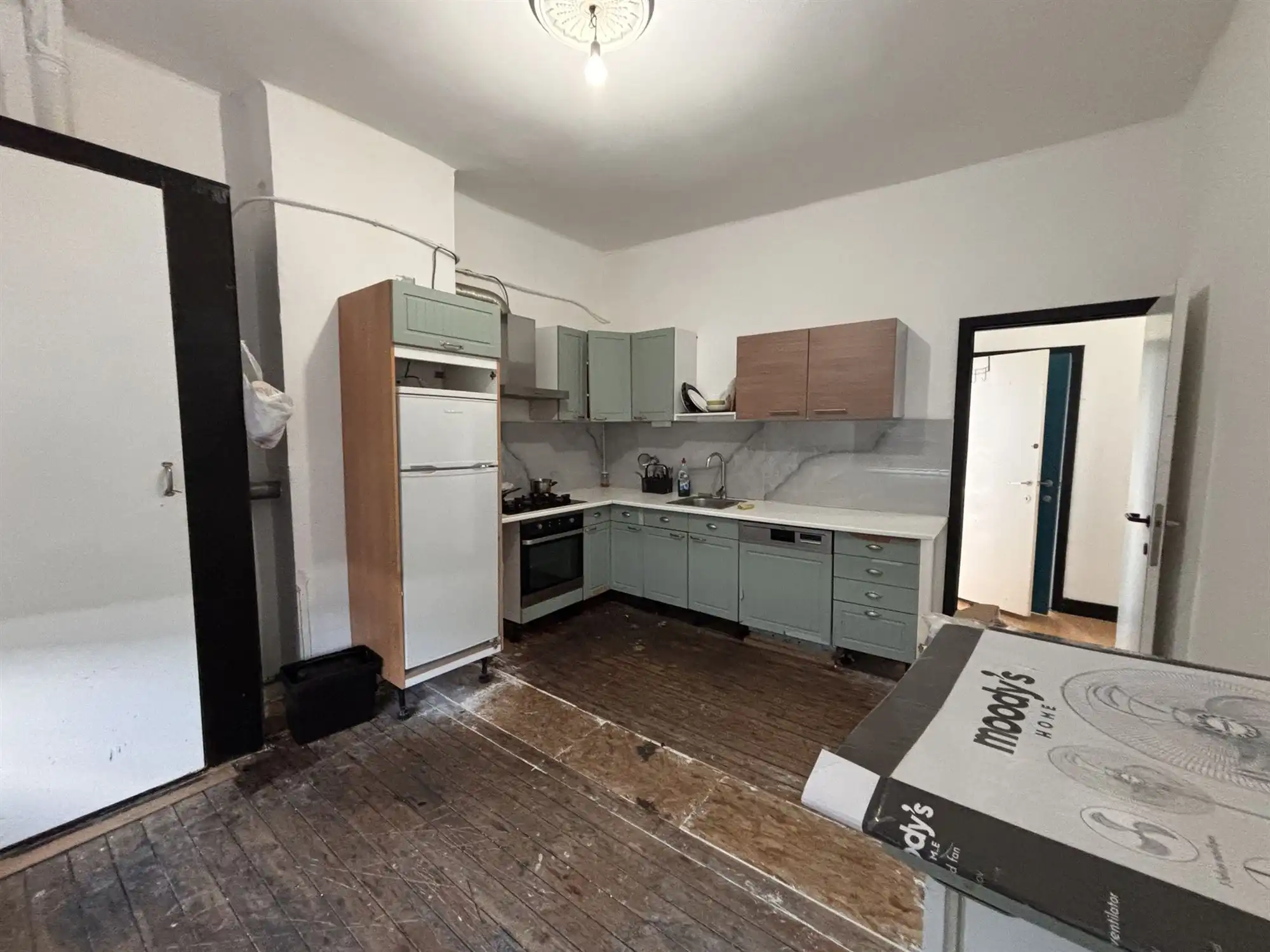 Opbrengsteigendom handelszaak + 3 appartementen foto 19