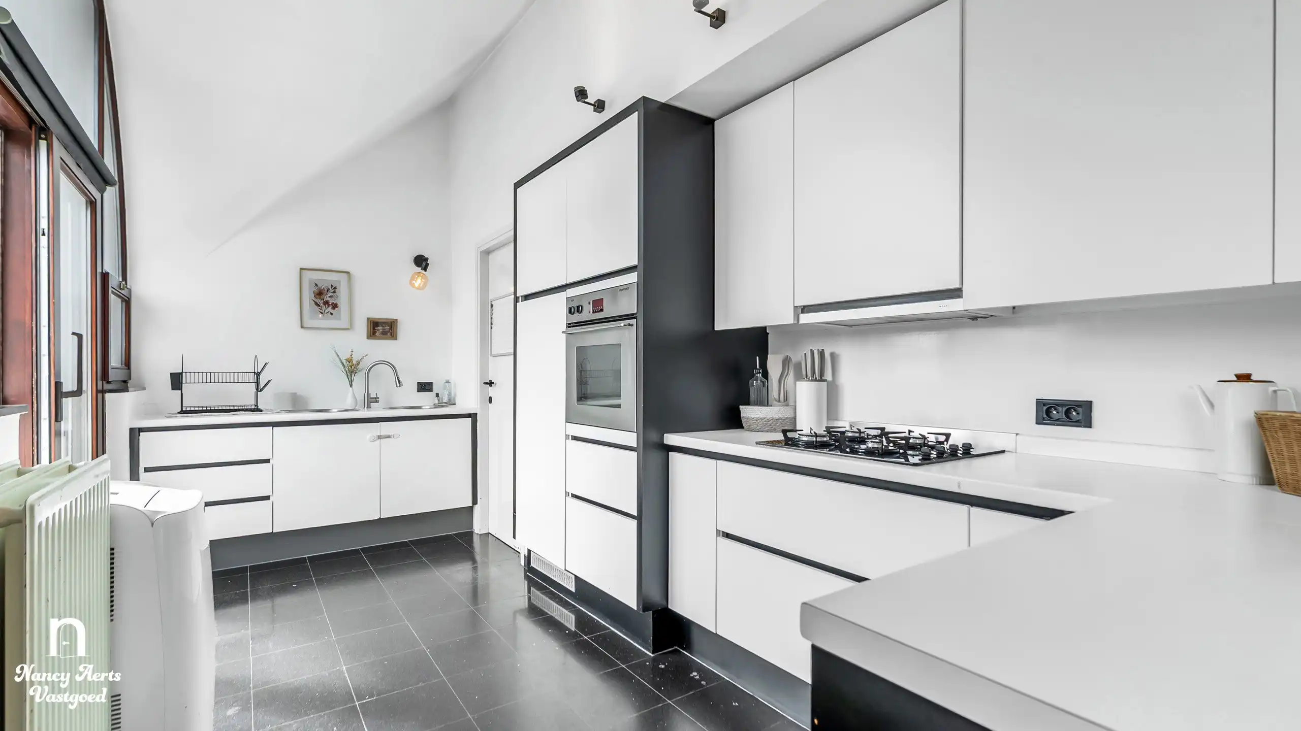 Lichtrijke duplex met open indeling en 3 slaapkamers foto 17