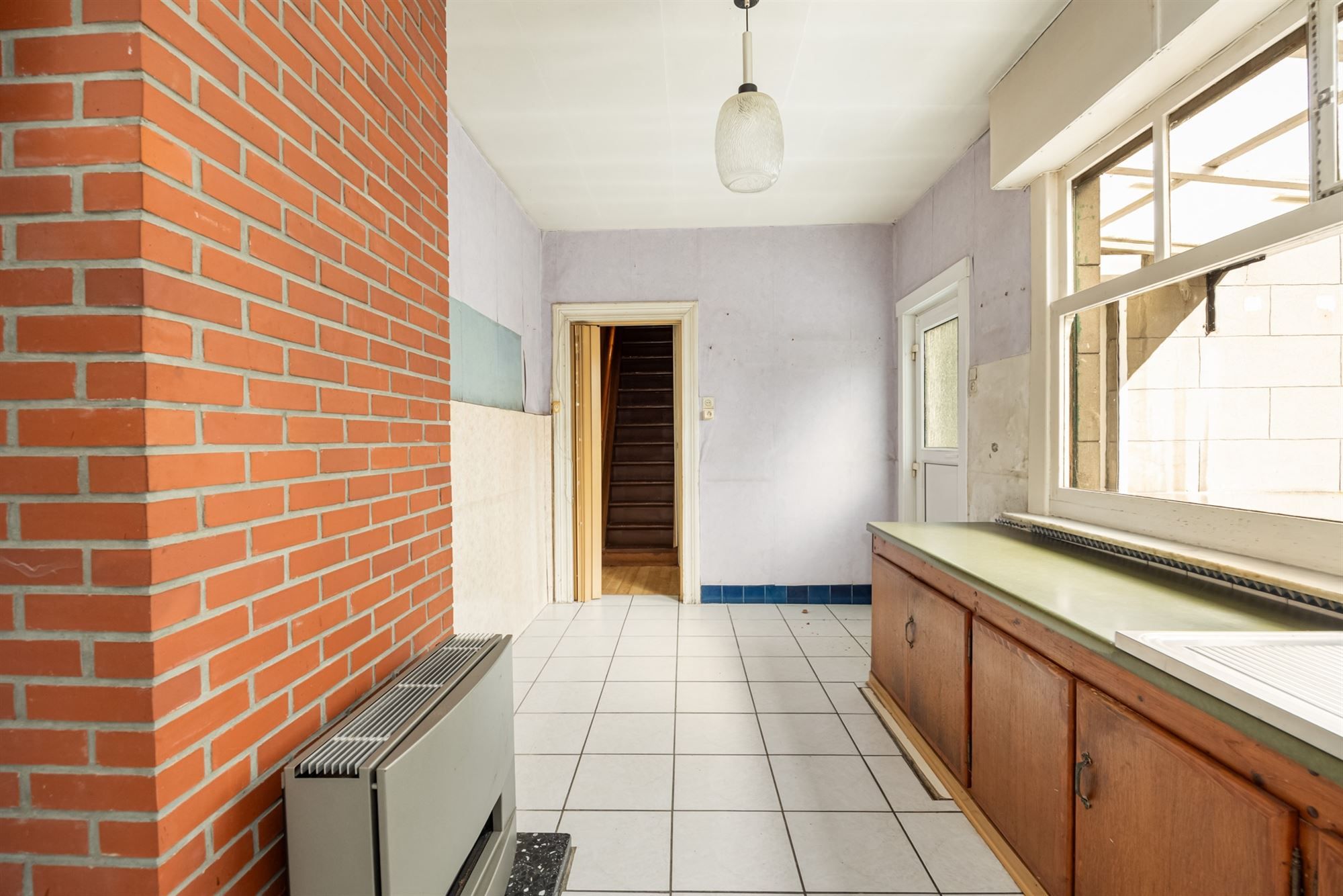 Te renoveren woning met opslagruimte in Mechelen foto 9