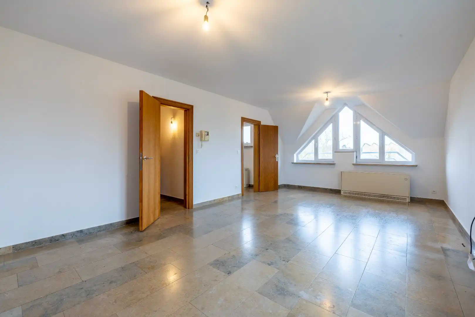 Instapklaar 3-slaapkamerappartement met autostaanplaats – ideaal als investering of eigen woonst foto 4