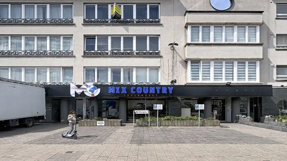 Interessant beleggingsvastgoed met verhuurd handelsgelijkvloers en appartement op toplocatie foto 12