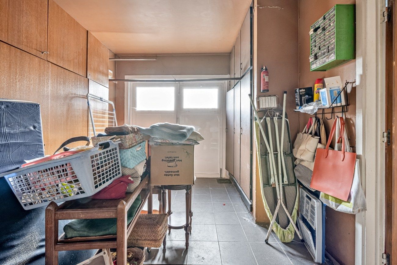 Gezellige, te renoveren, woning met charmante tuin aan een groenzone foto 15