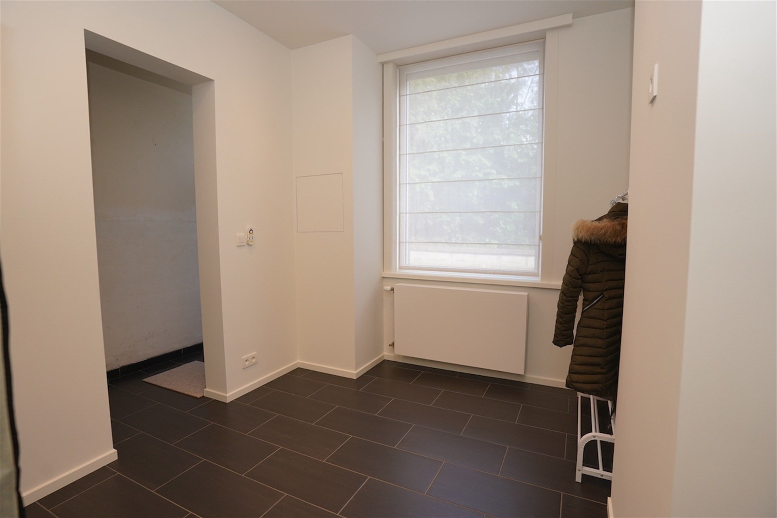 Instapklare woning met mooie tuin en privé garage achteraan foto 13