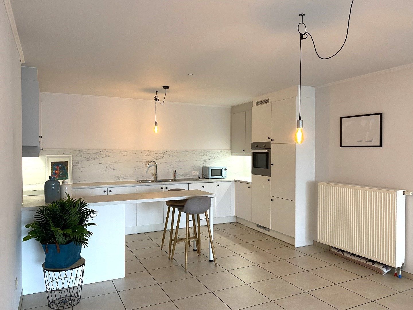 INSTAPKLAAR GELIJKVLOERS APPARTEMENT MET 2 SLPKS EN TERRAS foto 2