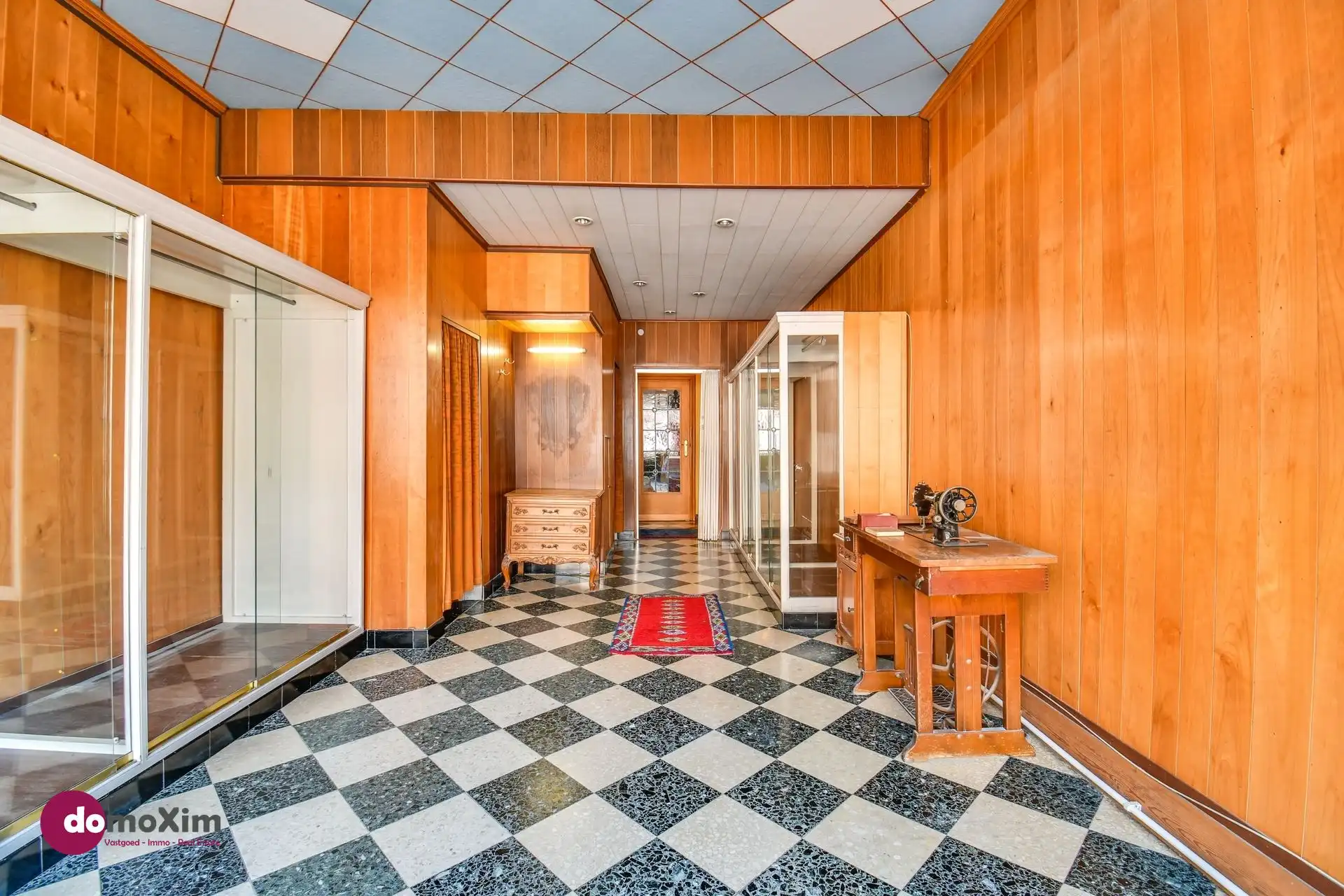 Te renoveren stadswoning met zuid-gerichte tuin en garage foto 3