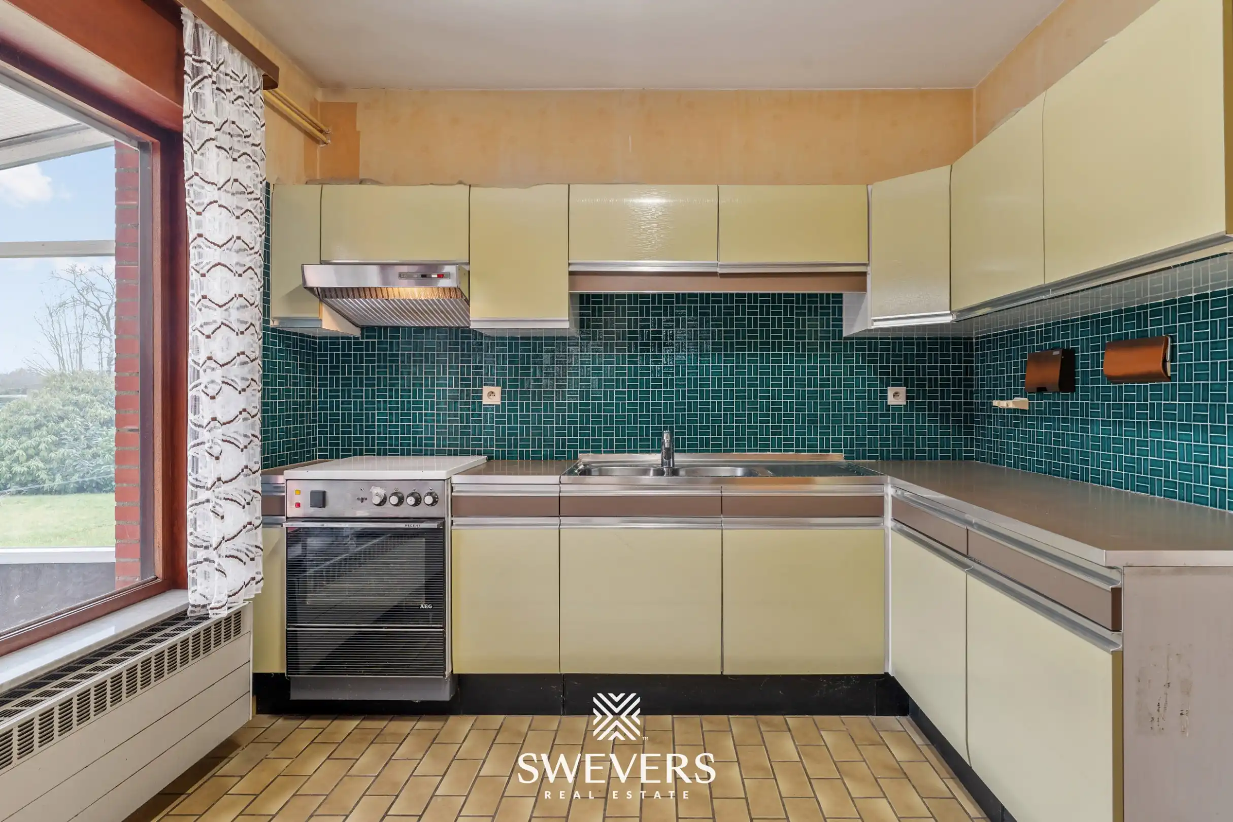 Charmante woning met ruime tuin en renovatiemogelijkheden in Halen foto 7