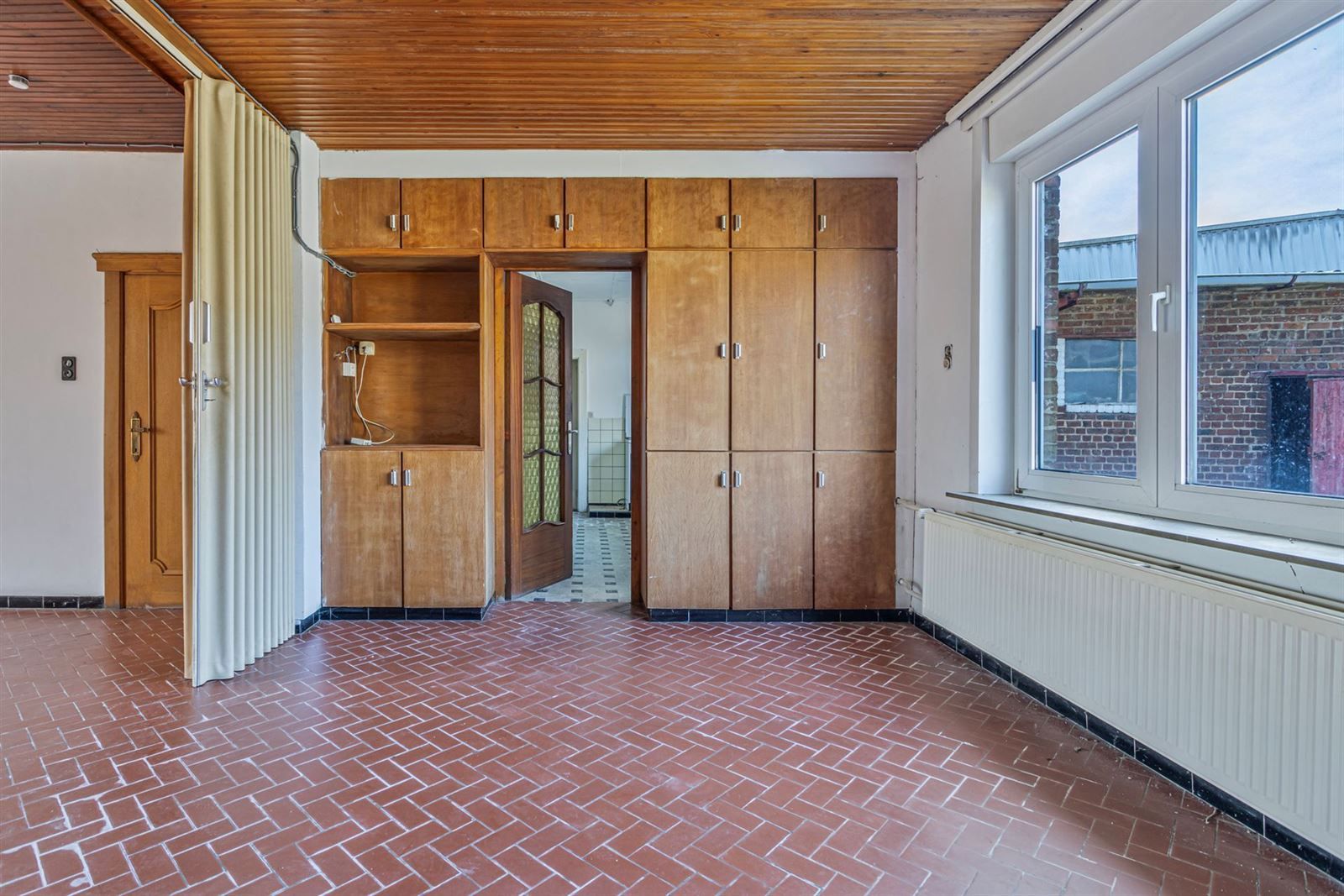 Te renoveren woning met schuur en loodsen  foto 10