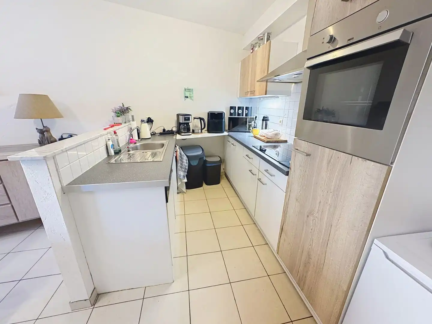 Recent en centraal gelegen appartement met garage foto 5