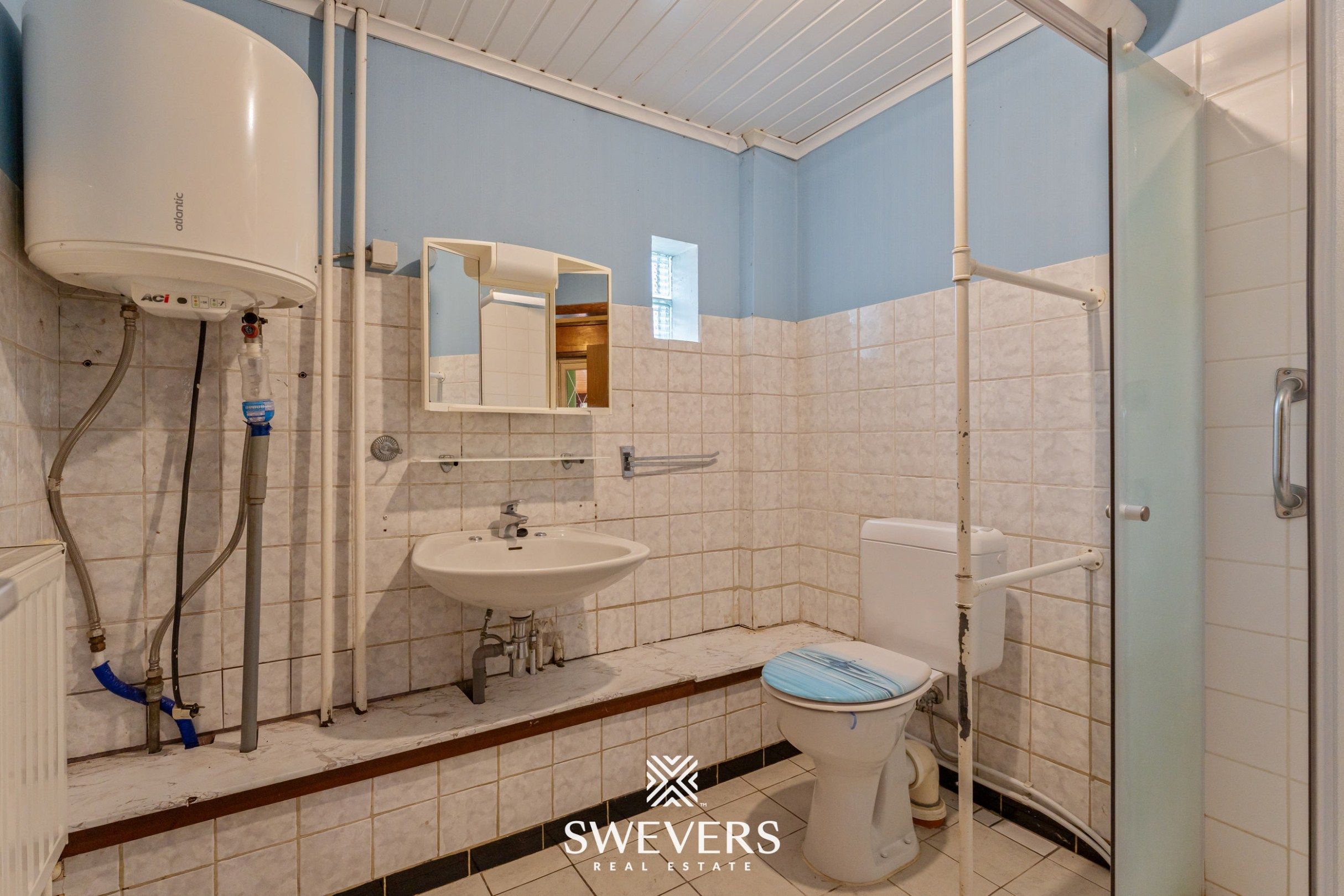 Ruime open bebouwing met potentieel en zuidgerichte tuin in rustige wijk van Houthalen foto 18