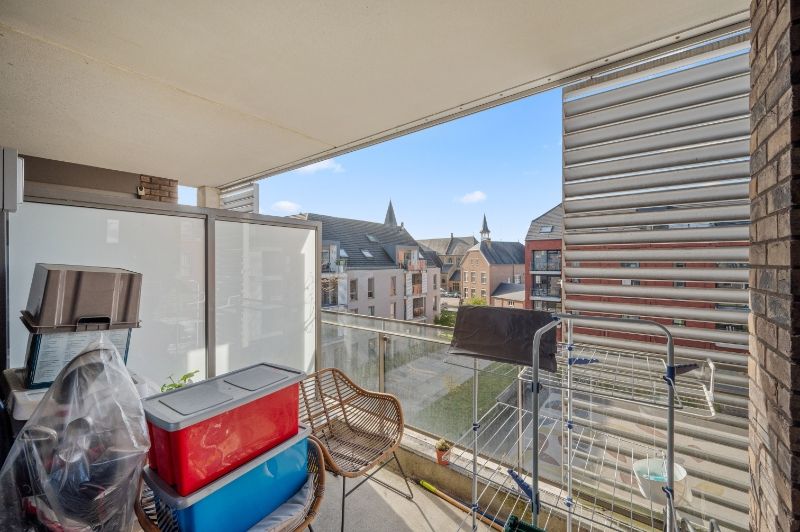 Groot 2-slaapkamer appartement met overdekte staanplaats foto 12