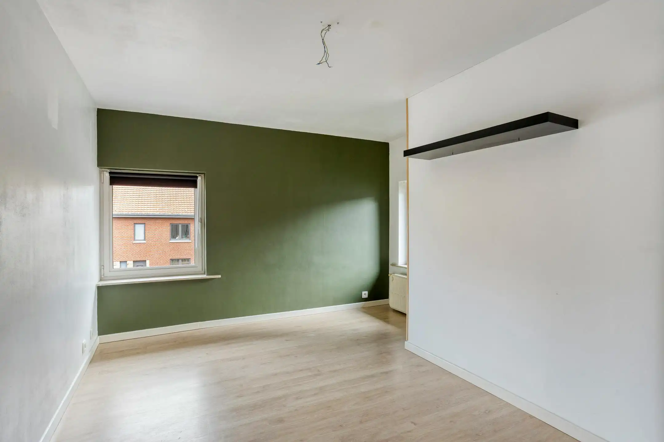 Driegevelwoning met extra studio/kantoor of praktijk, op een toplocatie in het centrum van Grimbergen! foto 10