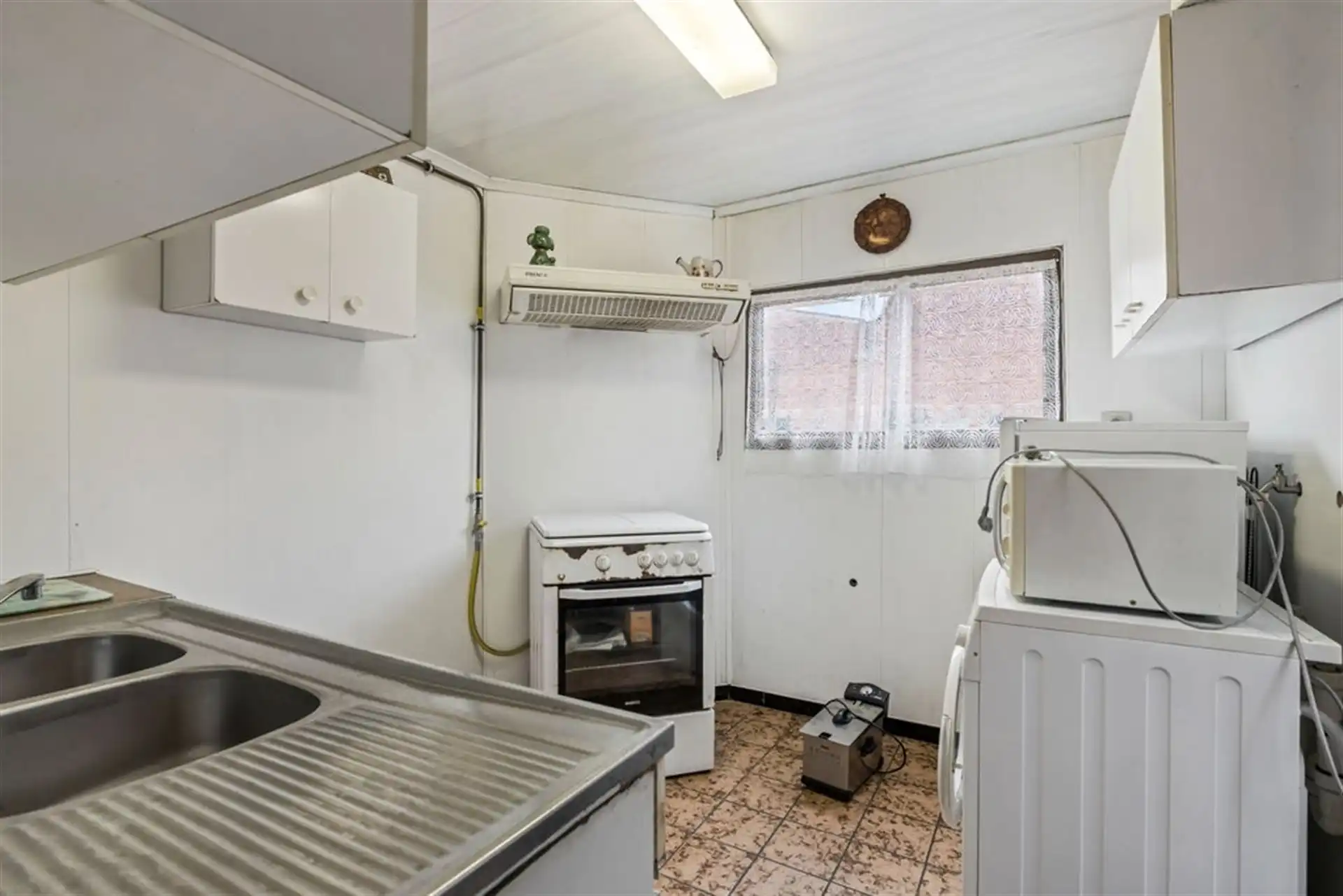 Potentiële gezinswoning of 2 bouwgronden in het hartje van Sint-Gillis-Waas foto 10