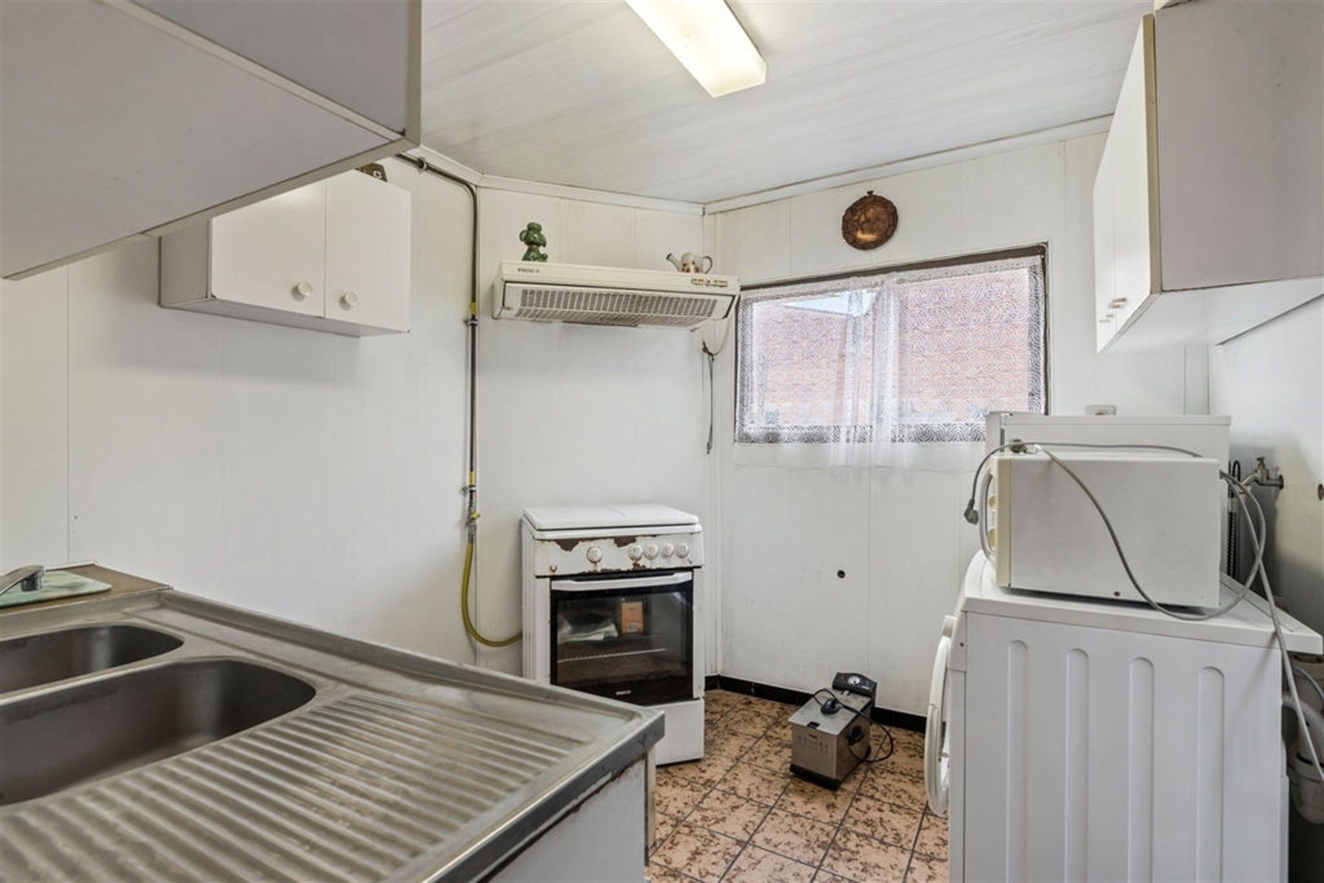 Potentiële gezinswoning of 2 bouwgronden in het hartje van Sint-Gillis-Waas foto 10