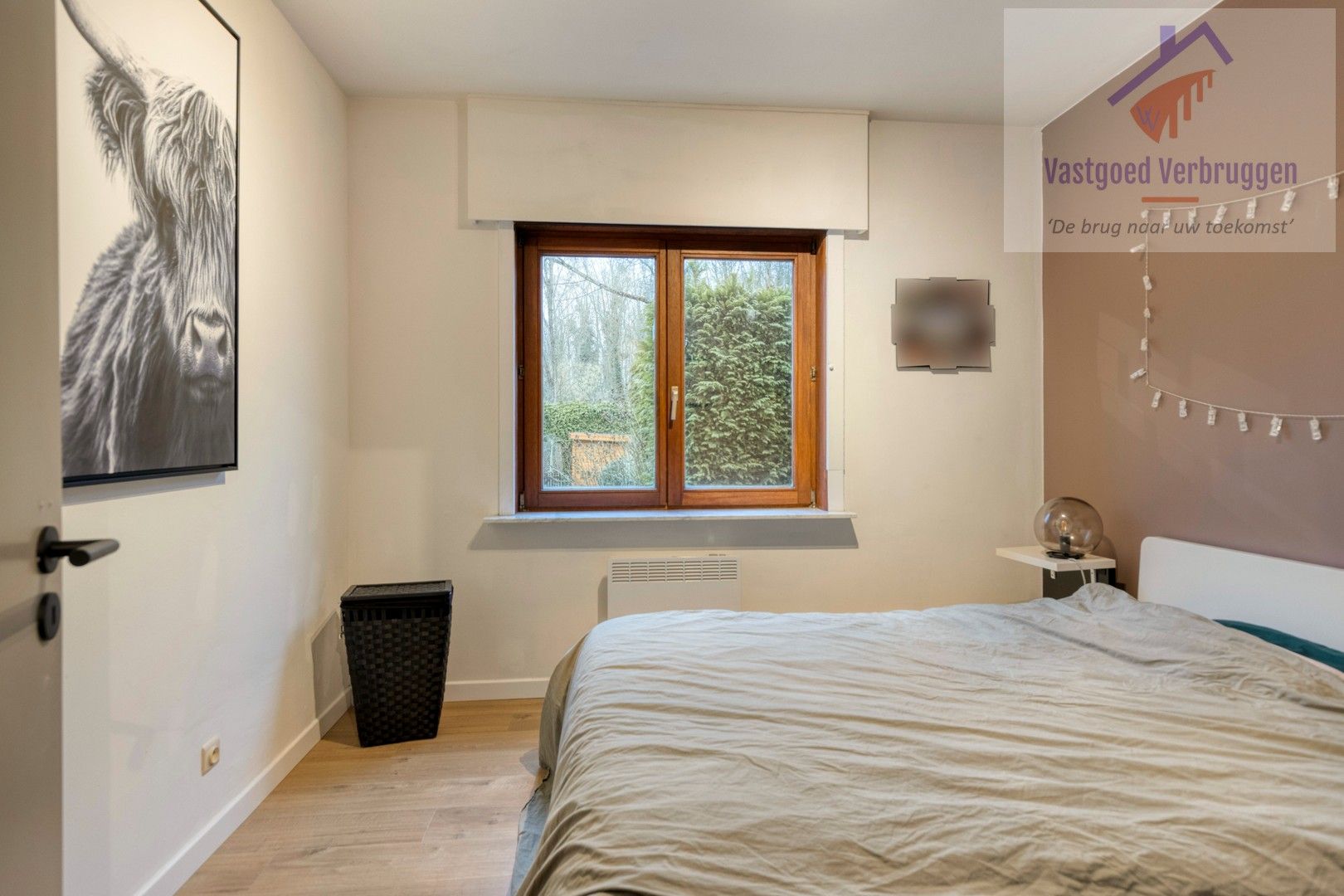 Gelijkvloers appartement met garagebox en prachtige tuin foto 7