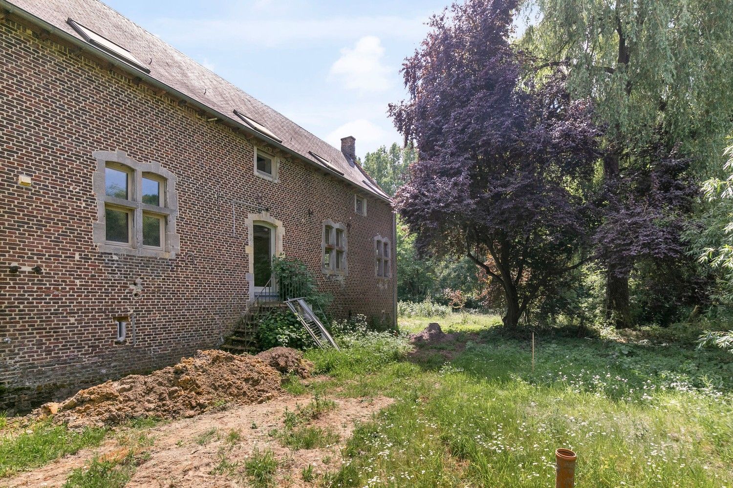 Prachtige woning in vierkantshoeve te koop! foto 2