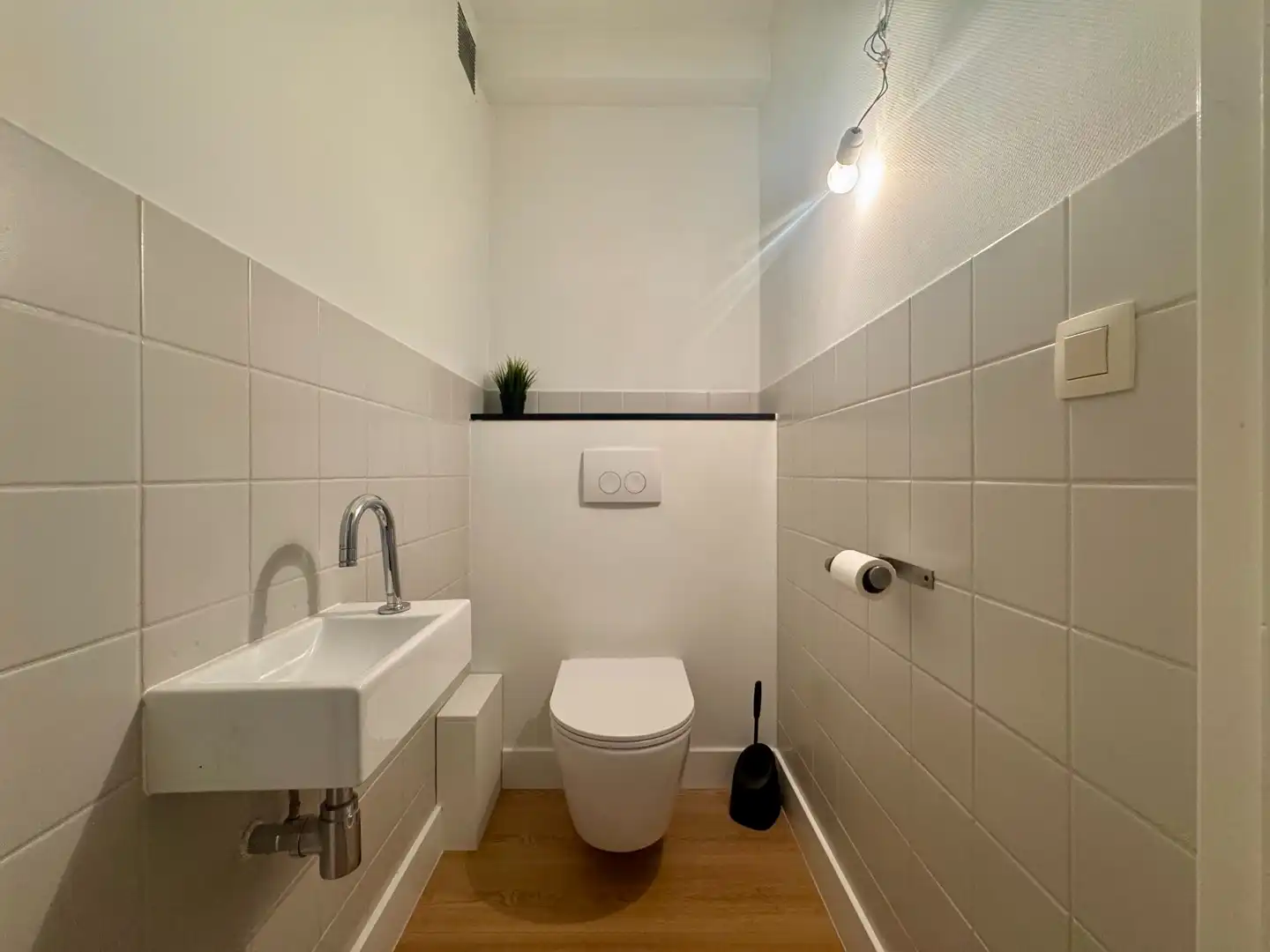 Ruim gerenoveerd gelijkvloers appartement met dubbele garage in het centrum van Diepenbeek foto 8