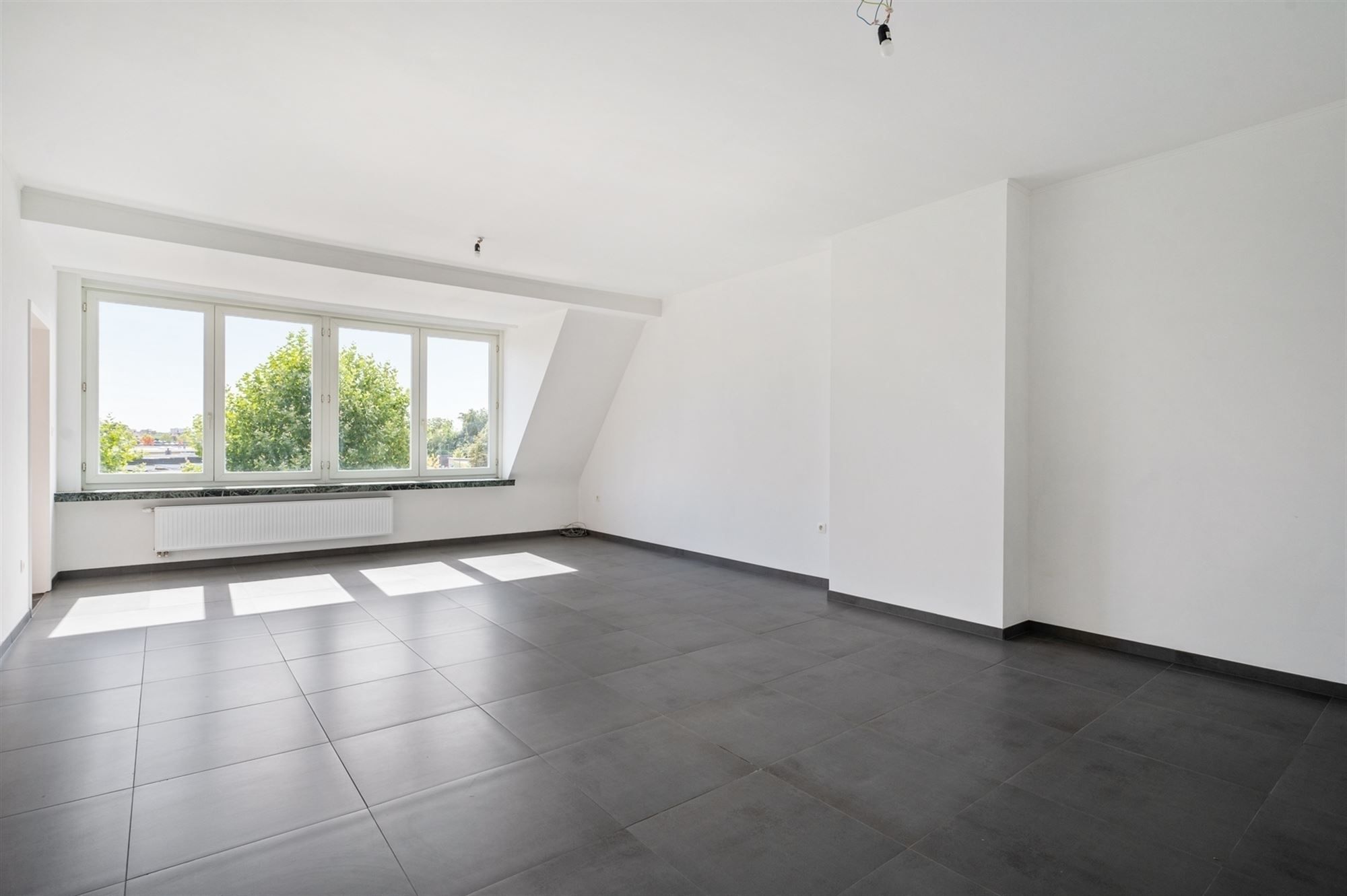 Gerenoveerd en lichtrijk appartement te Mechelen foto 2