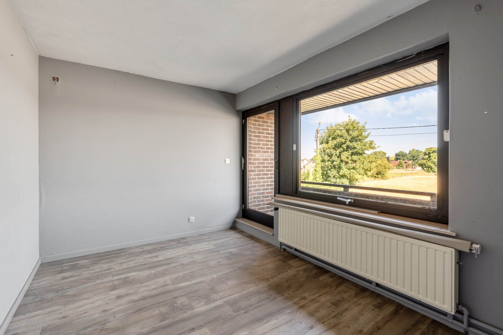 Multifunctioneel gebouw bestaande uit een woning, een winkel en een magazijn/werkplaats gelegen op een rustige locatie te Voorshoven! foto 23