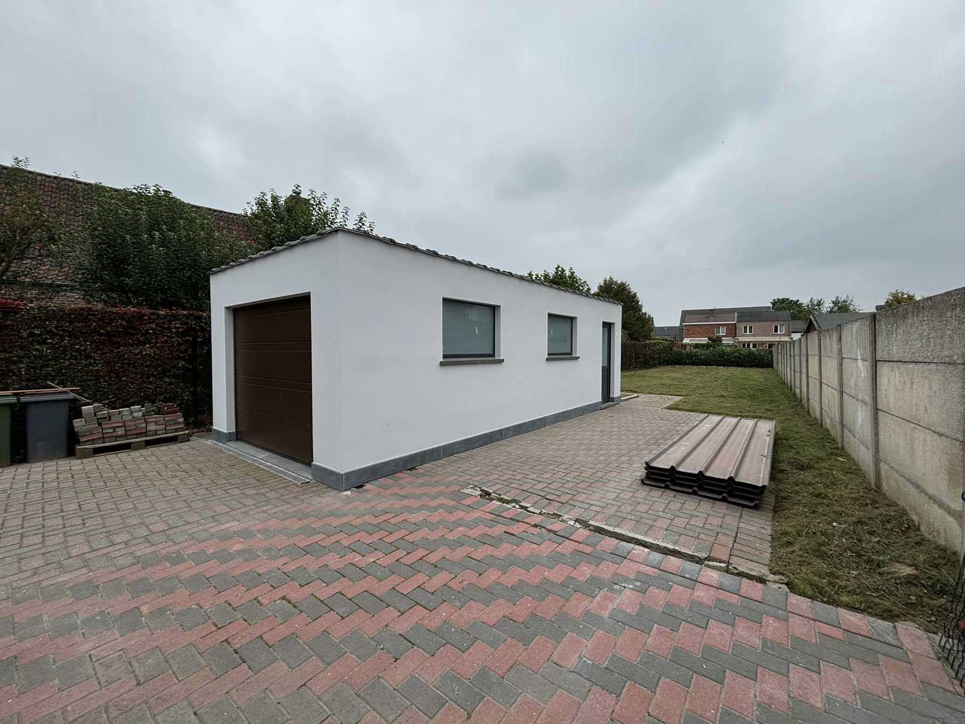 Halfopen bebouwing met 3 slaapkamers, garage en tuin  foto 5