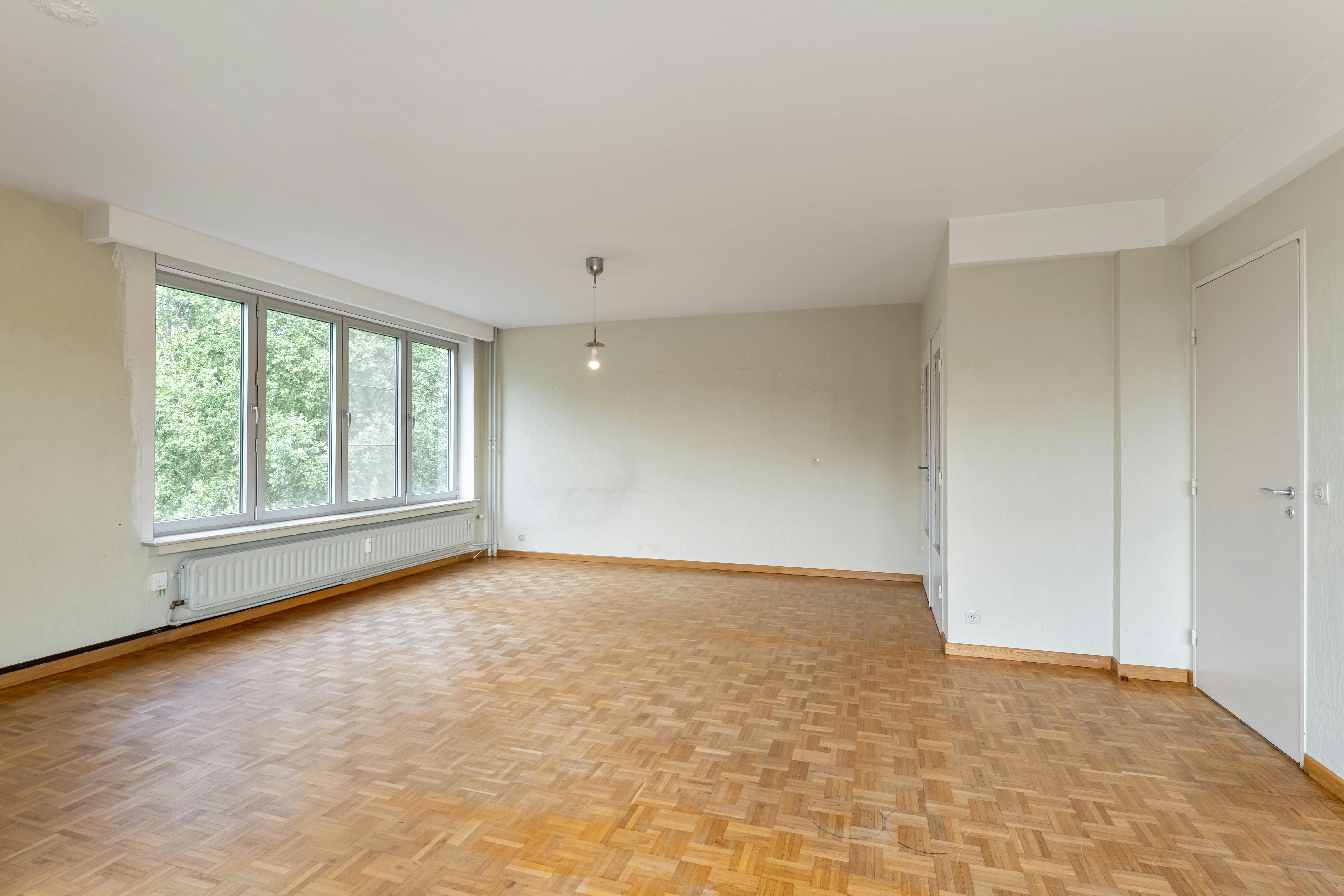 Ruim 3-slaapkamerappartement met terras en garagebox in hartje Genk foto 5