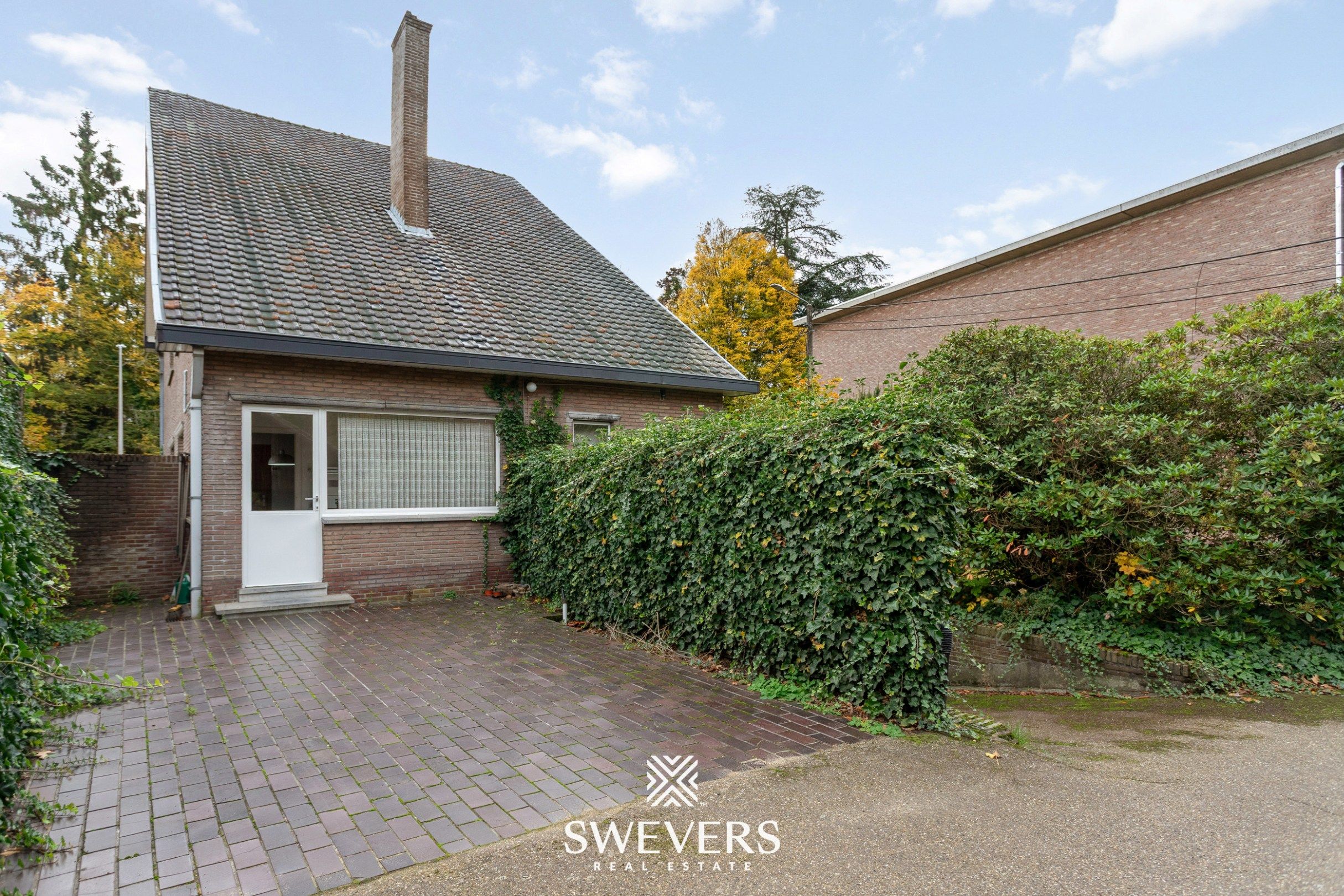 Open bebouwing met 4 slaapkamers, kelder en tuin in rustige, doodlopende straat foto 24