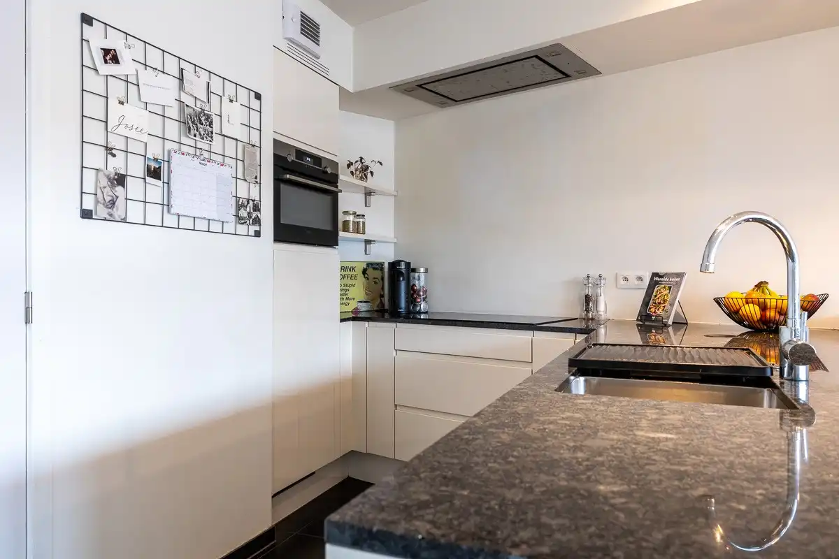 Ruim appartement met 3 slaapkamers en ondergrondse parkeerplaats foto 7