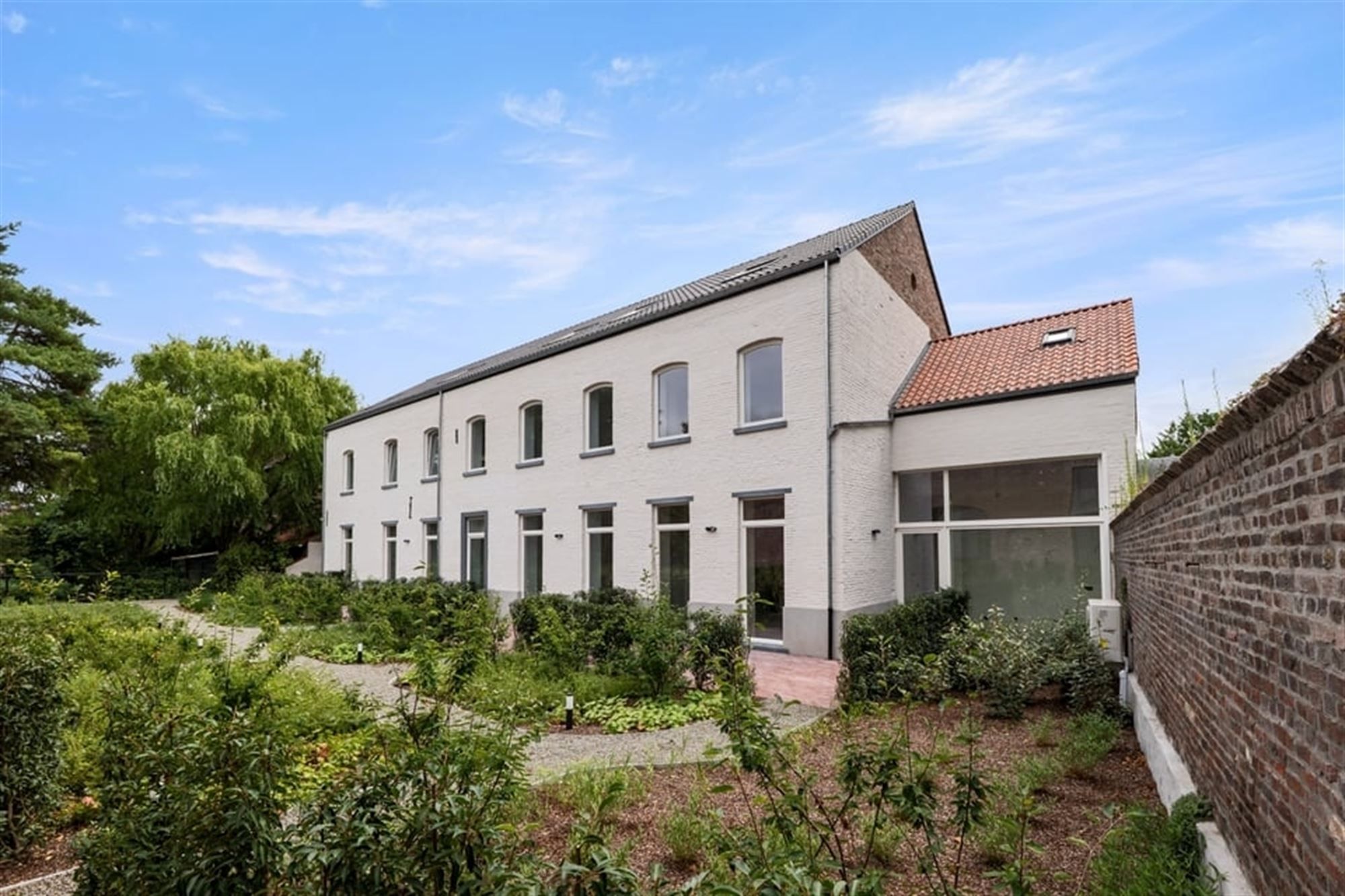 EXCLUSIEF WONEN IN EEN GERESTAUREERDE VIERKANTSHOEVE foto 10