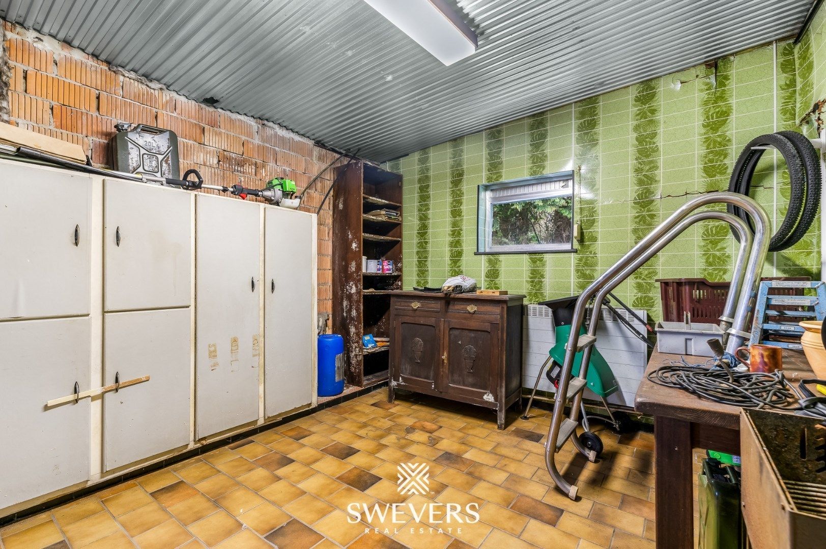 Gelijkvloerse woning met ruim magazijn op 34a 11ca foto 32