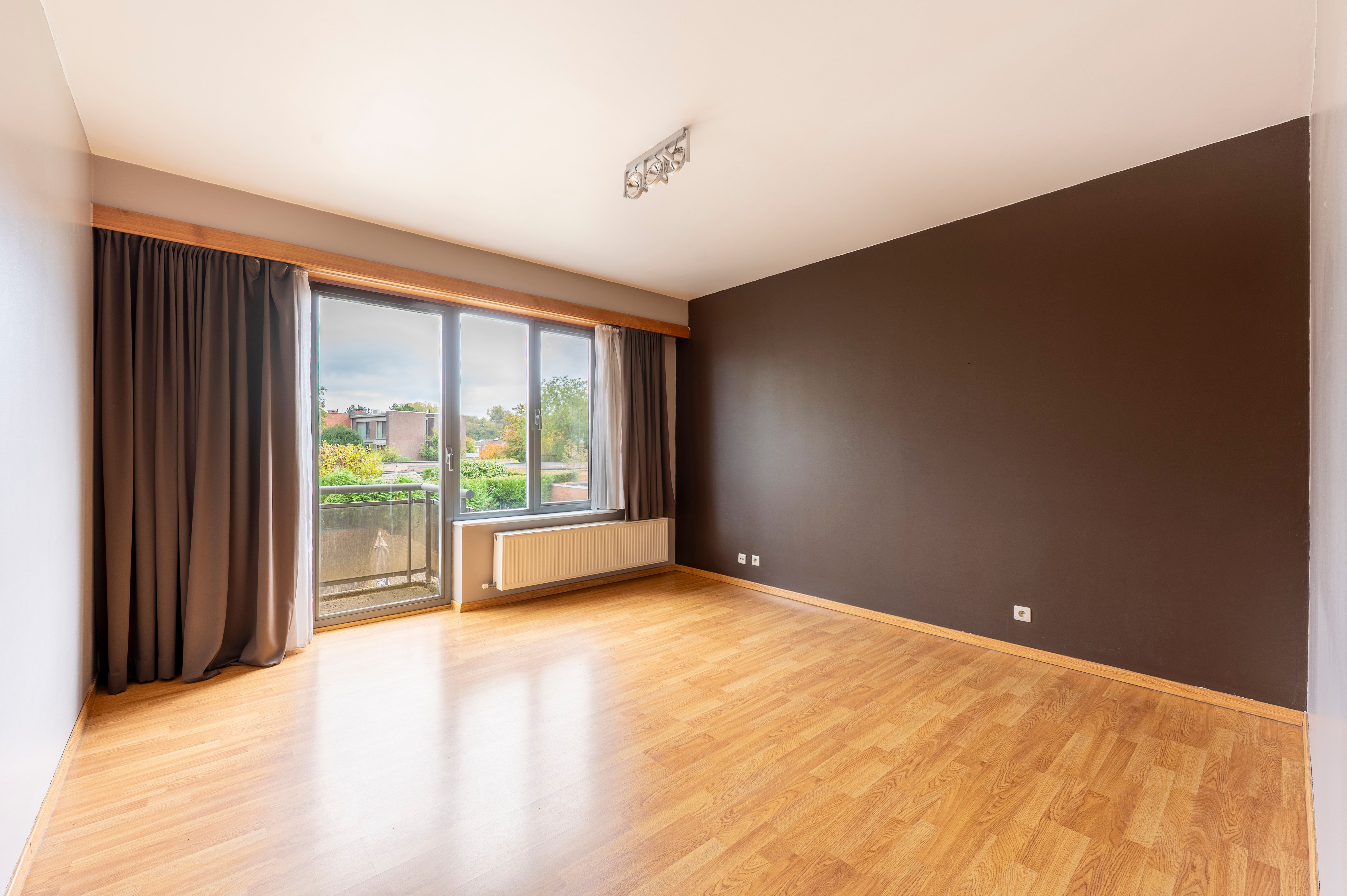 Ruim appartement met 2 slaapkamers, terras én garage in hartje Wommelgem! foto 11