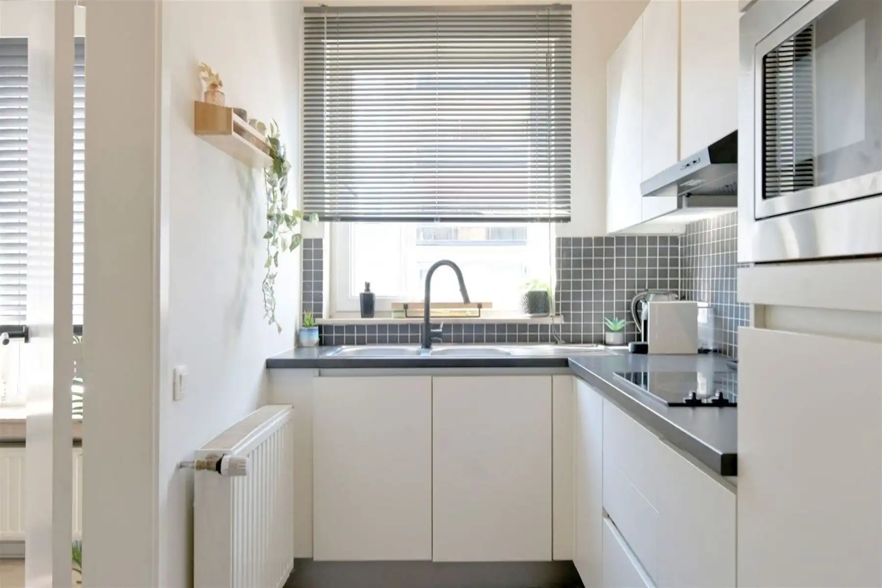 Gerenoveerd appartement met 2 slaapkamers op toplocatie! foto 6