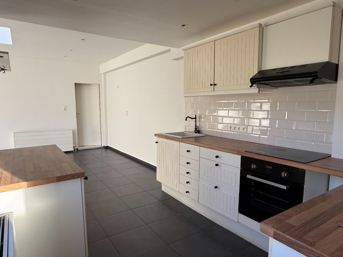 Verzorgd gelijkvloers 1-slpk appartement met tuin foto 9