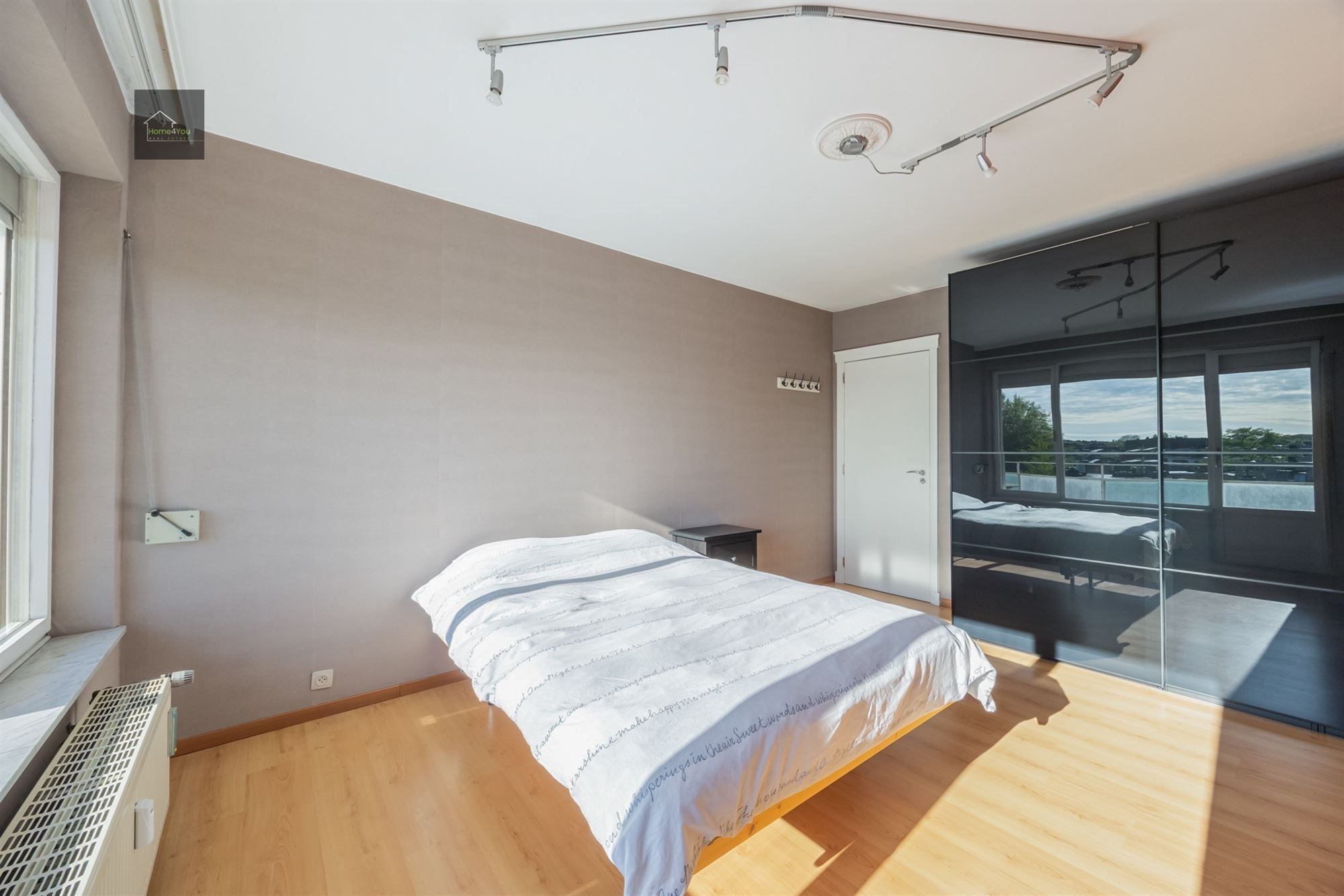 Lichtrijk appartement met 2 slaapkamers, autostaanplaats én groen uitzicht foto 21