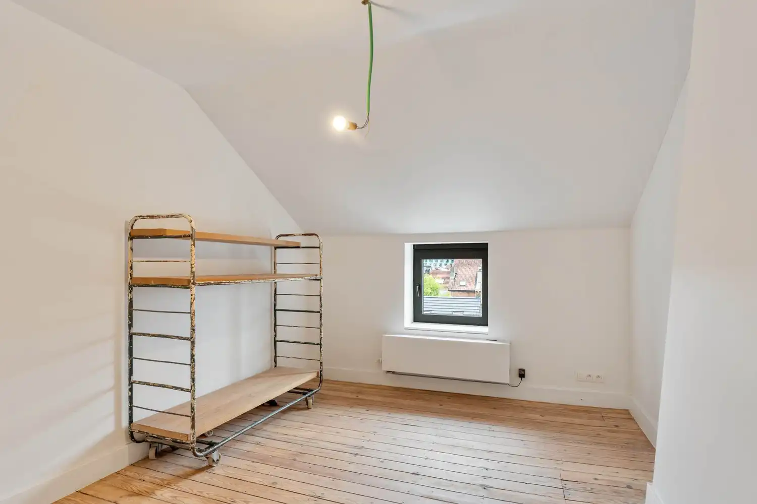 Prachtig gerenoveerd en energiezuinig herenhuis met 5 slaapkamers, 2 badkamers en een tuin op een toplocatie nabij het station van Leuven! foto 28
