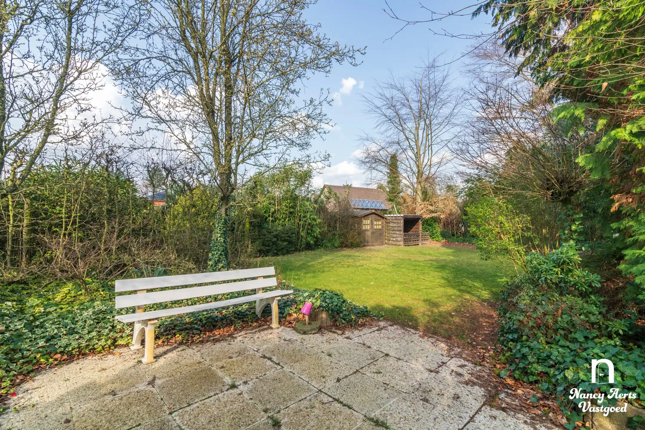 Goed onderhouden gezinswoning met grote tuin foto 6