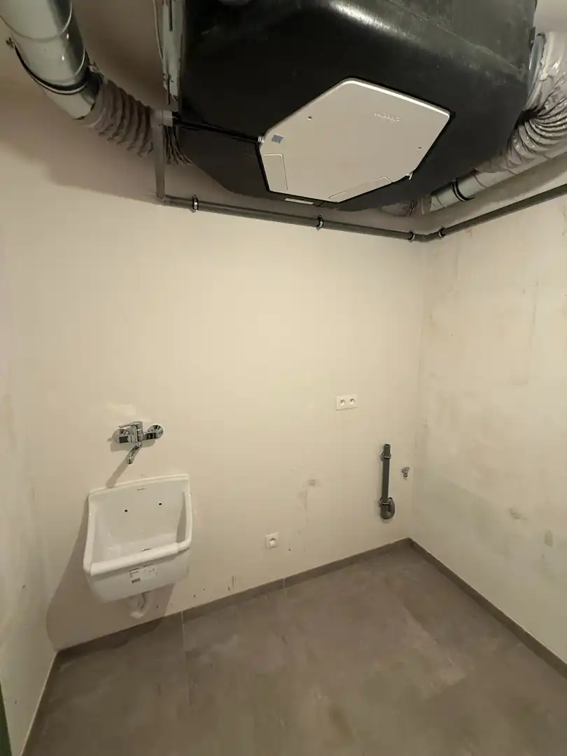 Instapklaar en energiezuinig gelijkvloers appartement met 1 slaapkamer en ruim terras te Riemst. foto 13