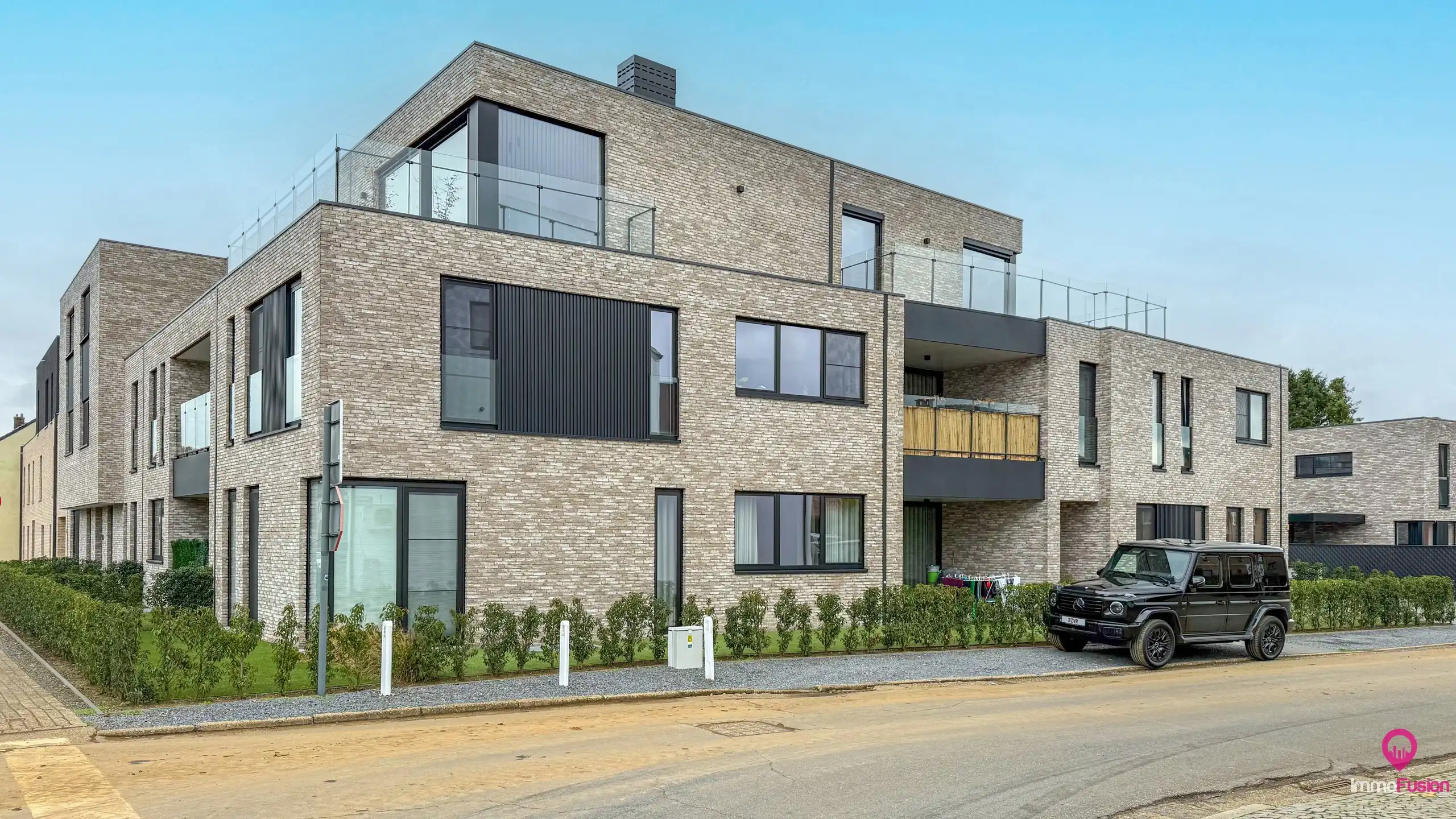 Nieuwbouwappartement met 2slk, garagebox in Heusden centrum! foto {{pictureIndex}}