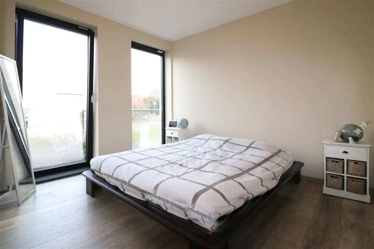 Gelijkvloers appartement met zuidgericht terras en tuintje, autostaanplaats foto 12