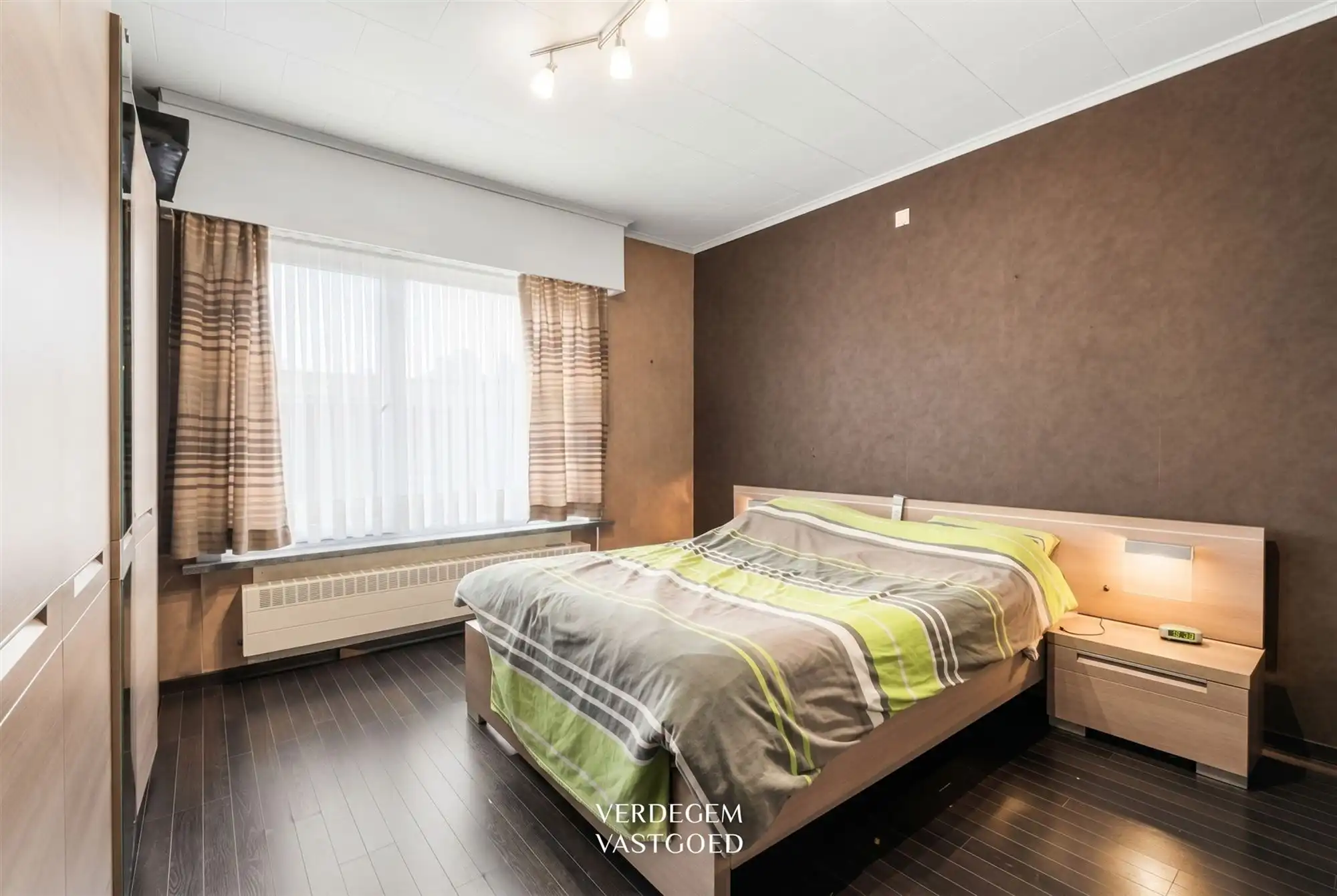 Ruime woning op royaal perceel van 1.014m² met 3 slaapkamers en geniettuin foto 11