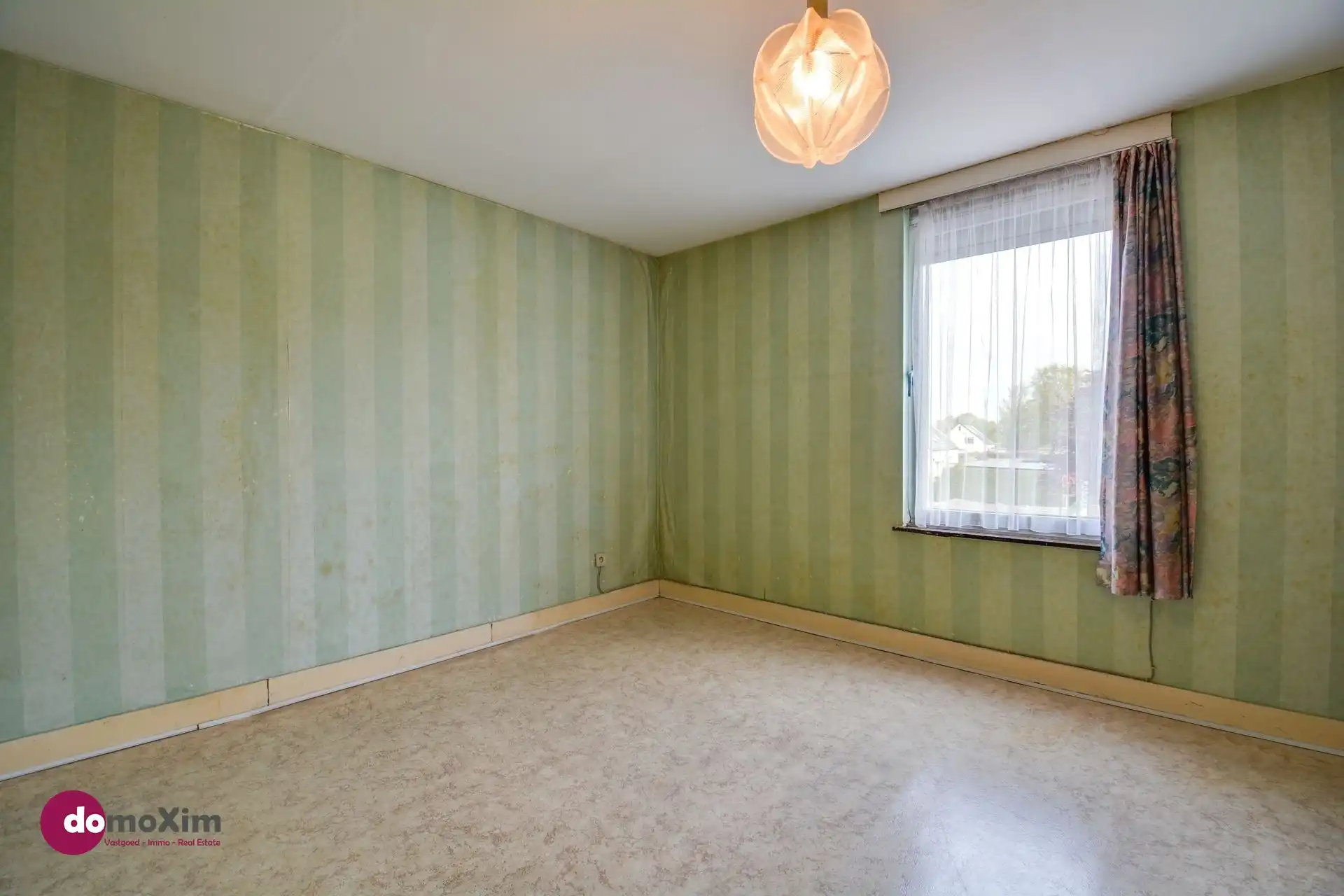 Te renoveren woning op bereikbare locatie in Boortmeerbeek foto 10