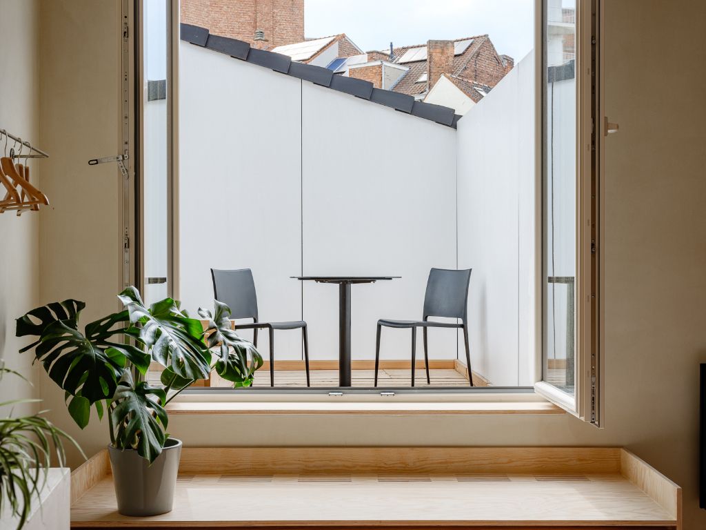 Bijzondere opbrengsteigendom bestaande uit een dakappartement en drie afzonderlijke kamers met eigen sanitair foto 17