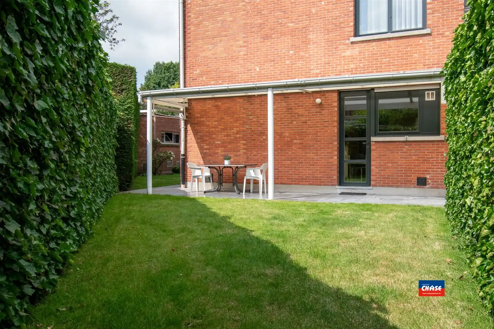 Woonhuis | twee appten + tuin + P  foto 18