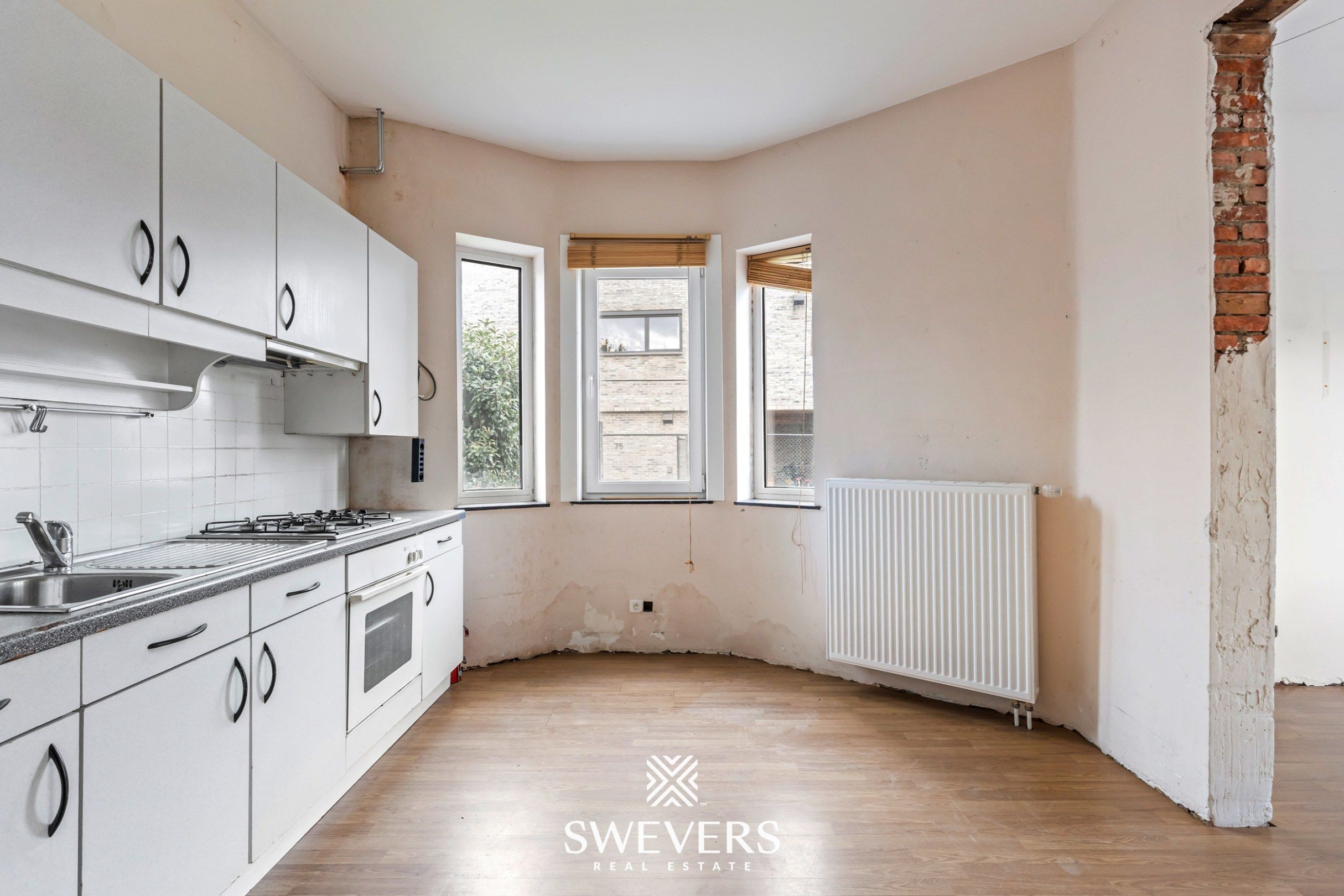 Unieke renovatiekans: karaktervol herenhuis te Zonhoven foto 9