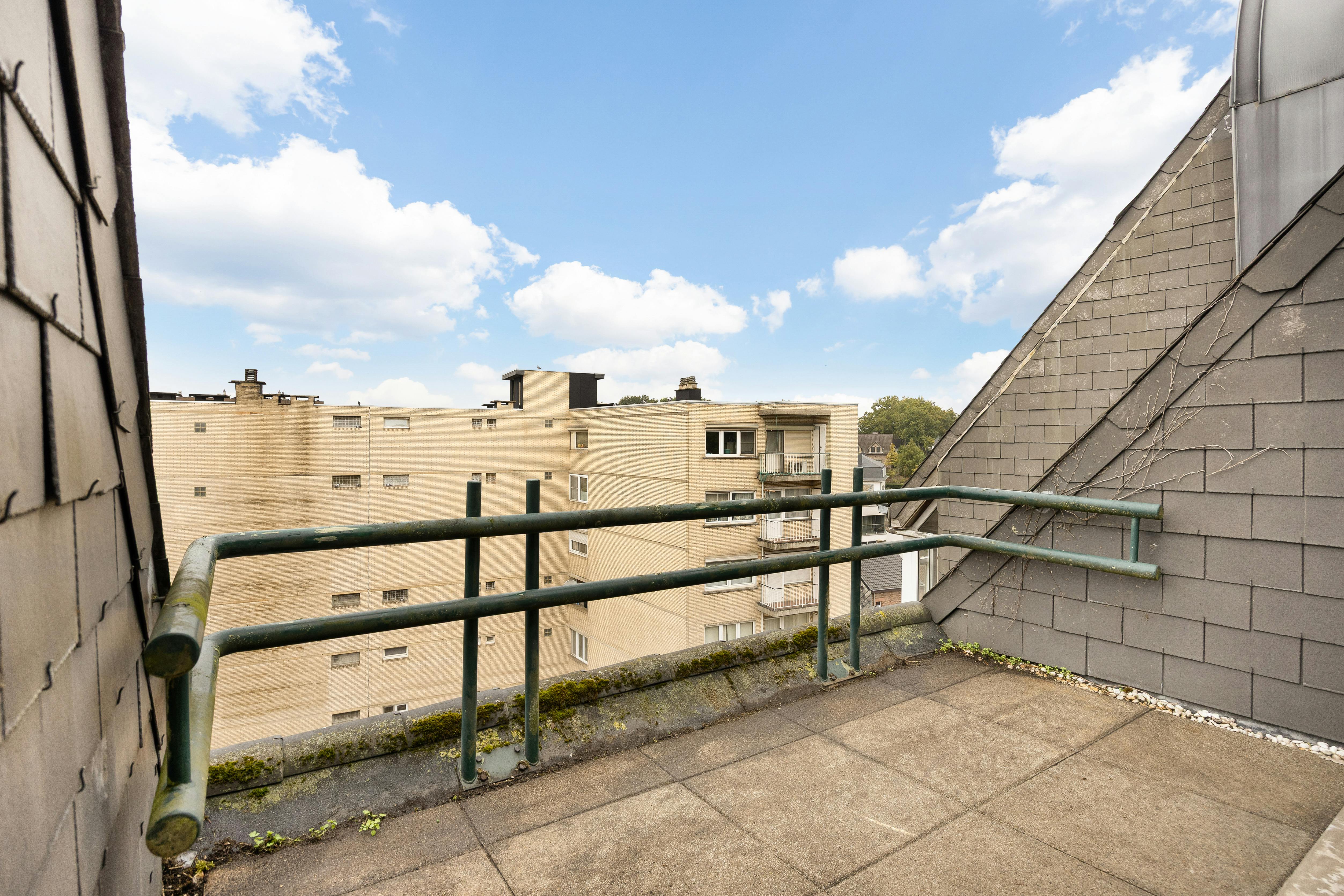 Penthouse in hartje Genk foto 12