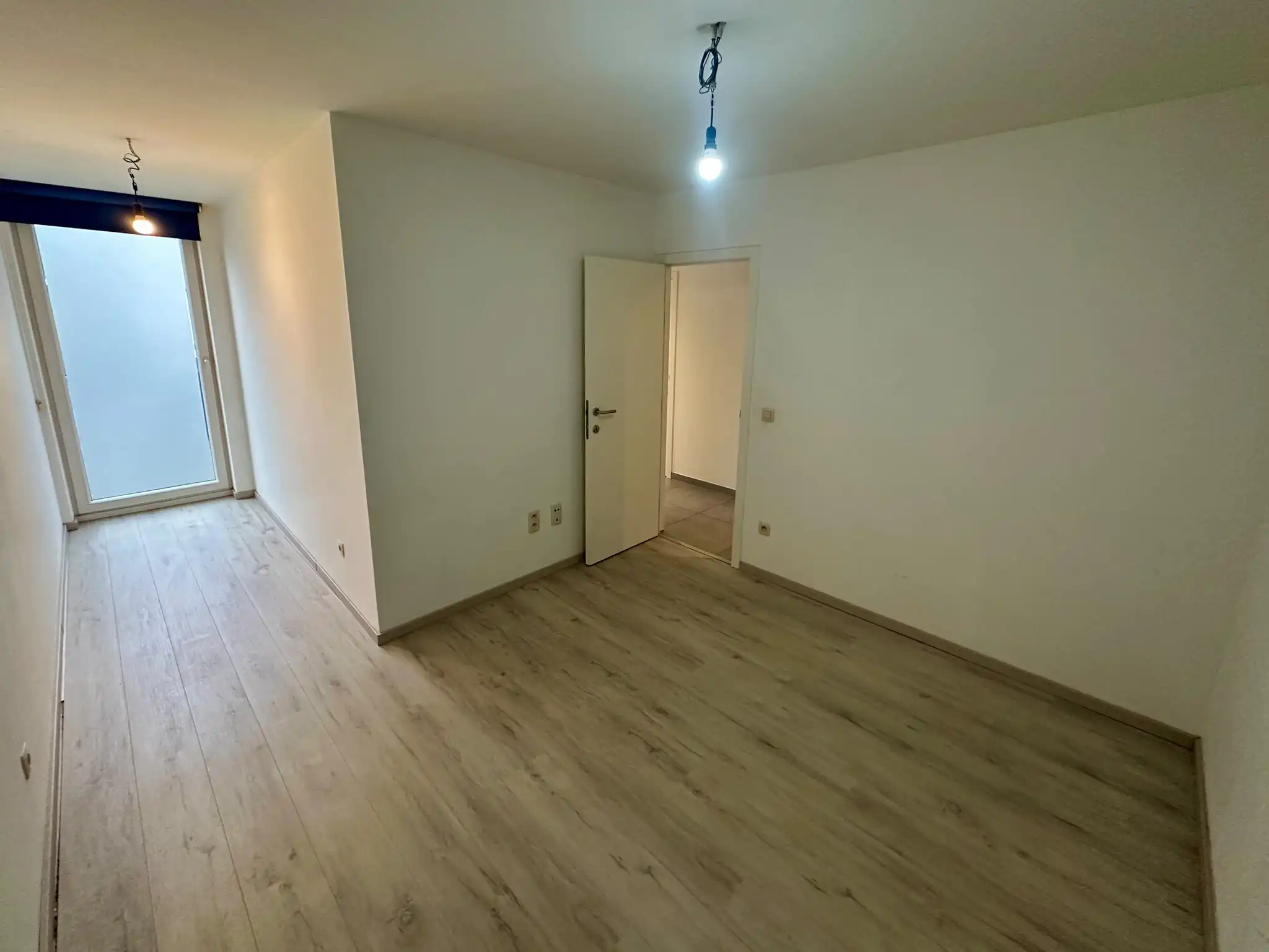 Gelijkvloers appartement met 2 slaapkamers, ruim terras en privé staanplaats foto 9
