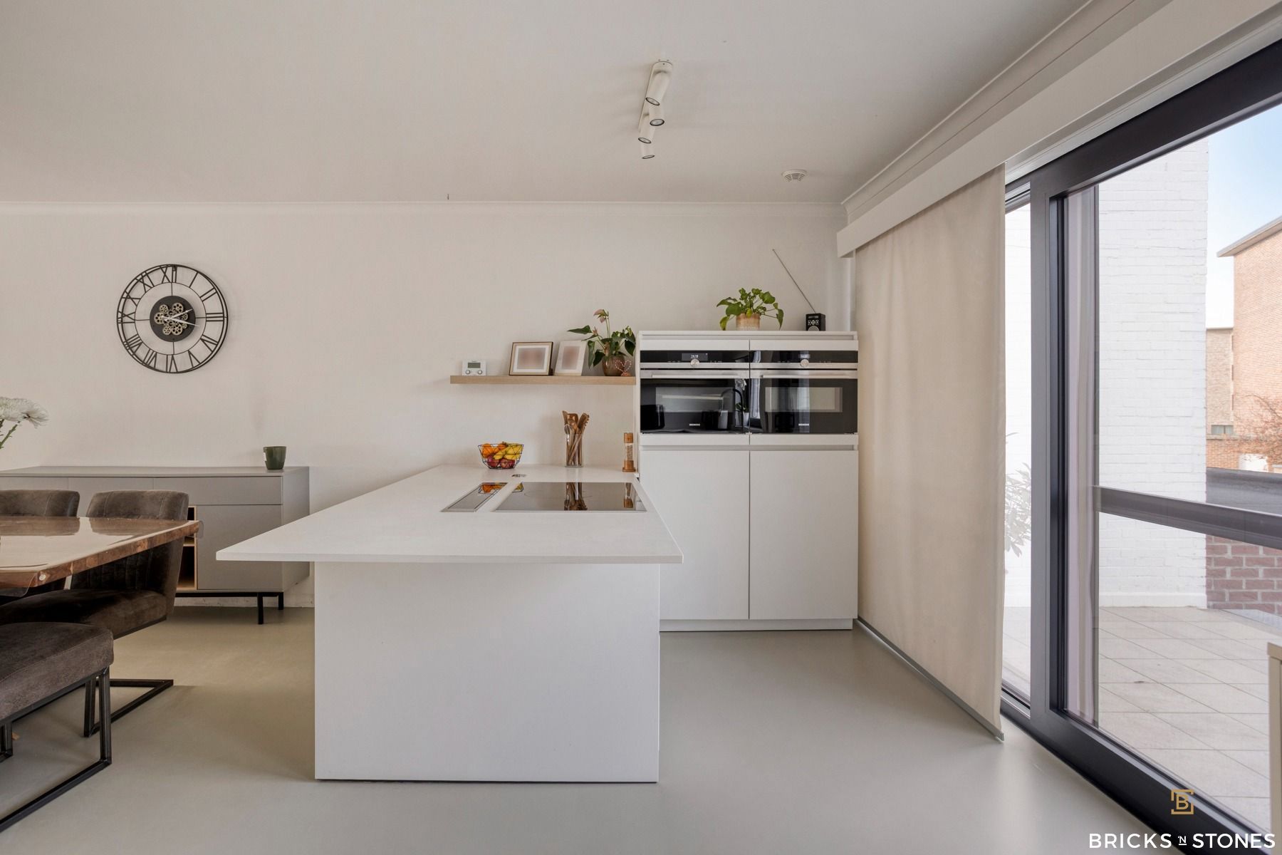 Knappe bel-etage woning met tuin foto 11