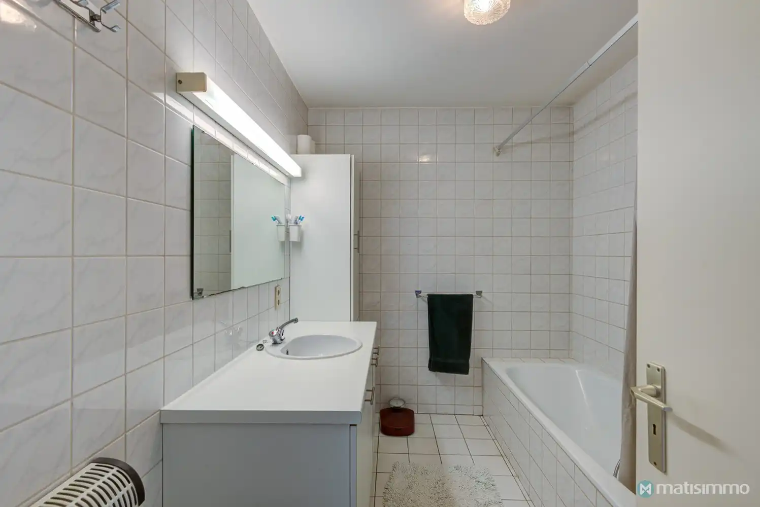 GUNSTIG GELEGEN APPARTEMENT MET 2 SLAAPKAMERS, GARAGE EN AUTOSTAANPLAATS TE BILZEN foto 9