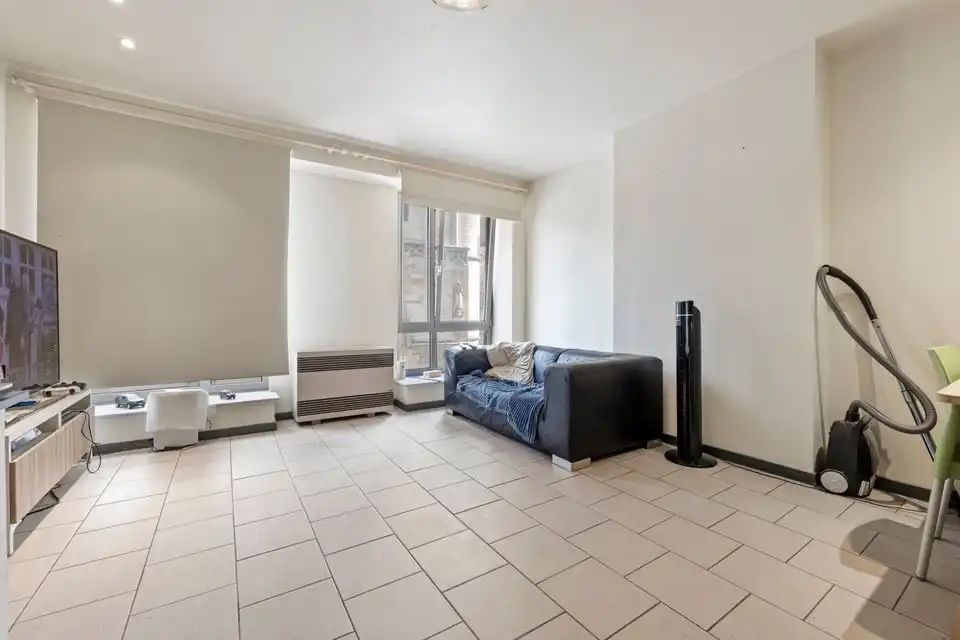 KNAP HANDELSPAND MET TWEE APART VERHUURDE APPARTEMENTEN IN HET CENTRUM VAN SINT-TRUIDEN foto 18