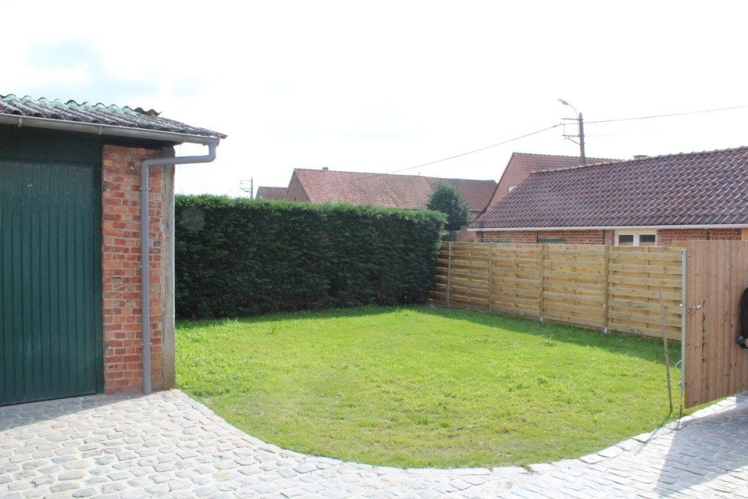 Woning 3 slpk + bureau met mooie tuin en garage foto 4