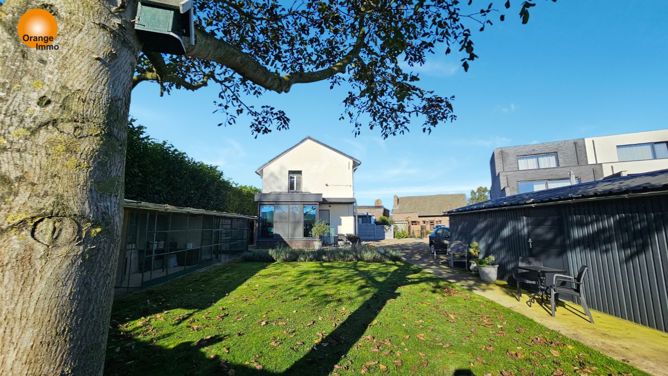 Charmante halfopen woning met tuin, rustig gelegen aan de Maas. foto 10