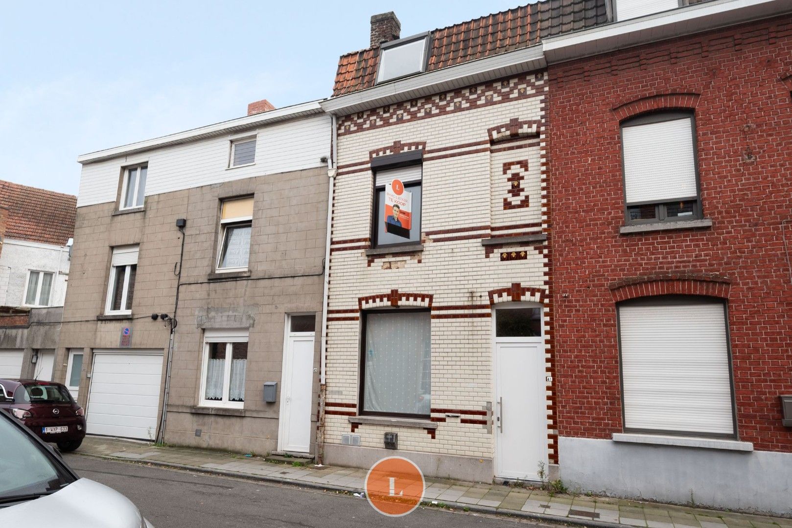 Op te frissen woning in centrum Menen te koop foto {{pictureIndex}}